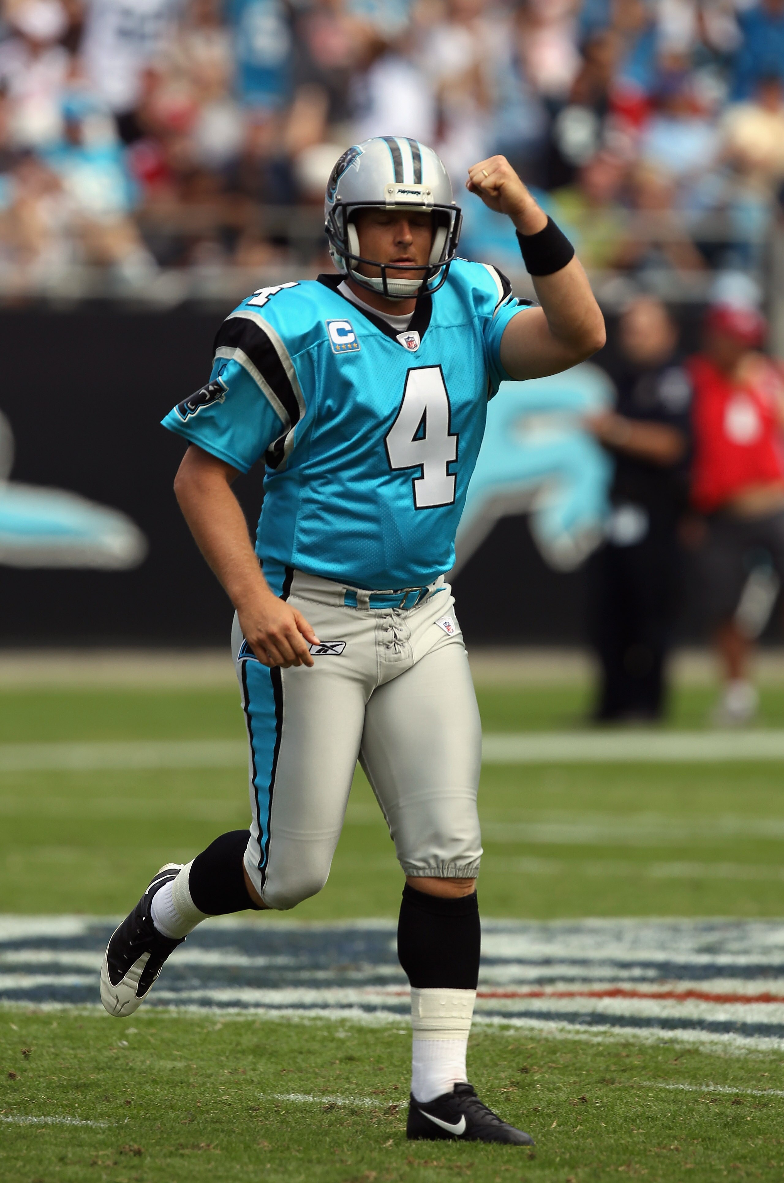 CHARLOTTE, NC - OCTOBER 24:  John Kasay #4 of the Carolina Panthers celebrates after kicking a field goal against the San Francisco 49ers during their game at Bank of America Stadium on October 24, 2010 in Charlotte, North Carolina.  (Photo by Streeter Le