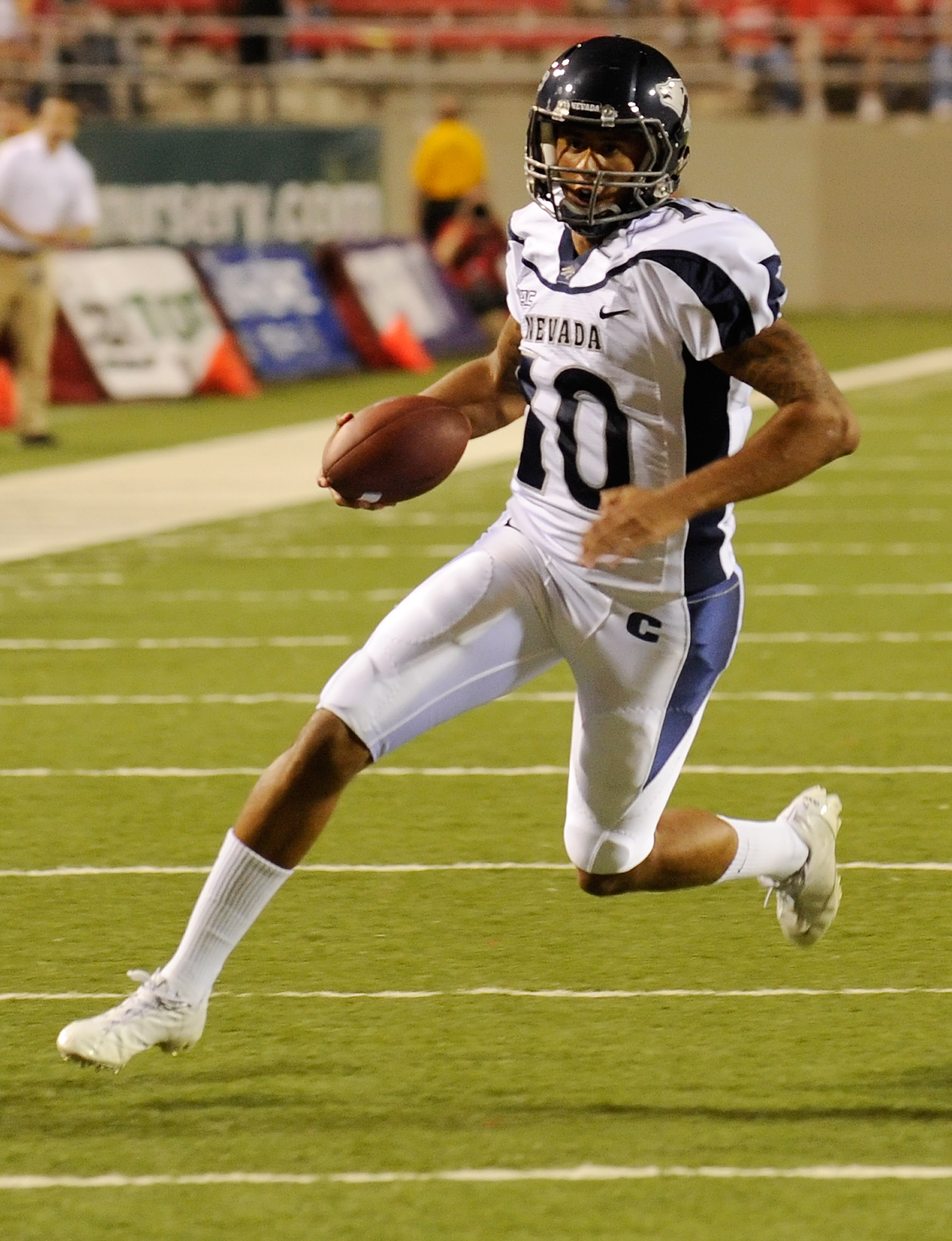 LAS VEGAS - OCTOBER 02: Quarterback Colin Kaepernick #10 of the Nevada Reno Wolf Pack runs for a touchdown against the UNLV Rebels in the first quarter of their game at Sam Boyd Stadium October 2, 2010 in Las Vegas, Nevada. Nevada Reno won 44-26. (Photo LAS VEGAS - OCTOBER 02: Quarterback Colin Kaepernick #10 of the Nevada Reno Wolf Pack runs for a touchdown against the UNLV Rebels in the first quarter of their game at Sam Boyd Stadium October 2, 2010 in Las Vegas, Nevada. Nevada Reno won 44-26. (Photo