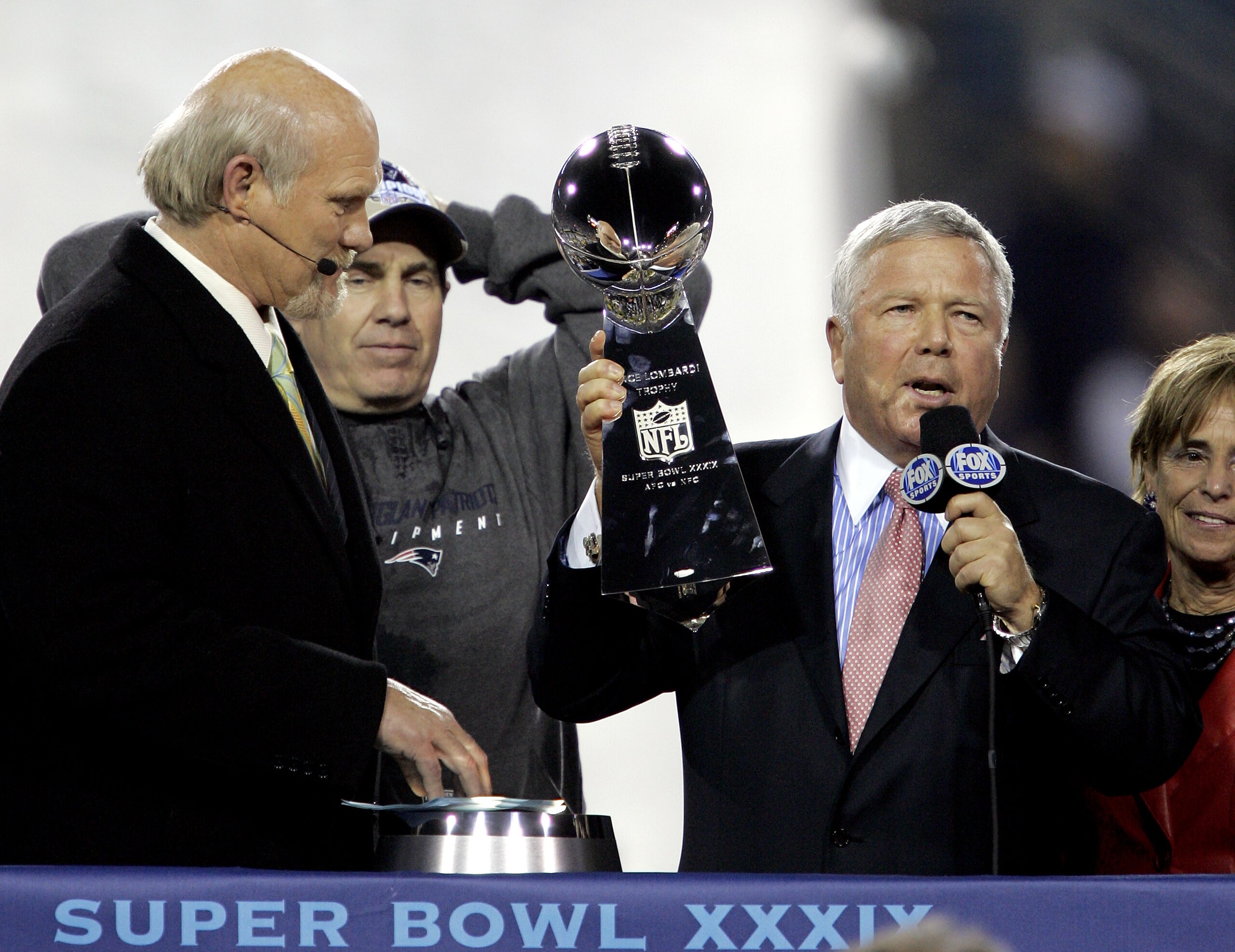 JACKSONVILLE, FL - FEBRUARY 6:   New England Patriots owner Robert Kraft speaks while holding the Lombardi trophy after defeating the Philadelphia Eagles in Super Bowl XXXIX at Alltel Stadium on February 6, 2005 in Jacksonville, Florida.  The Patriots def