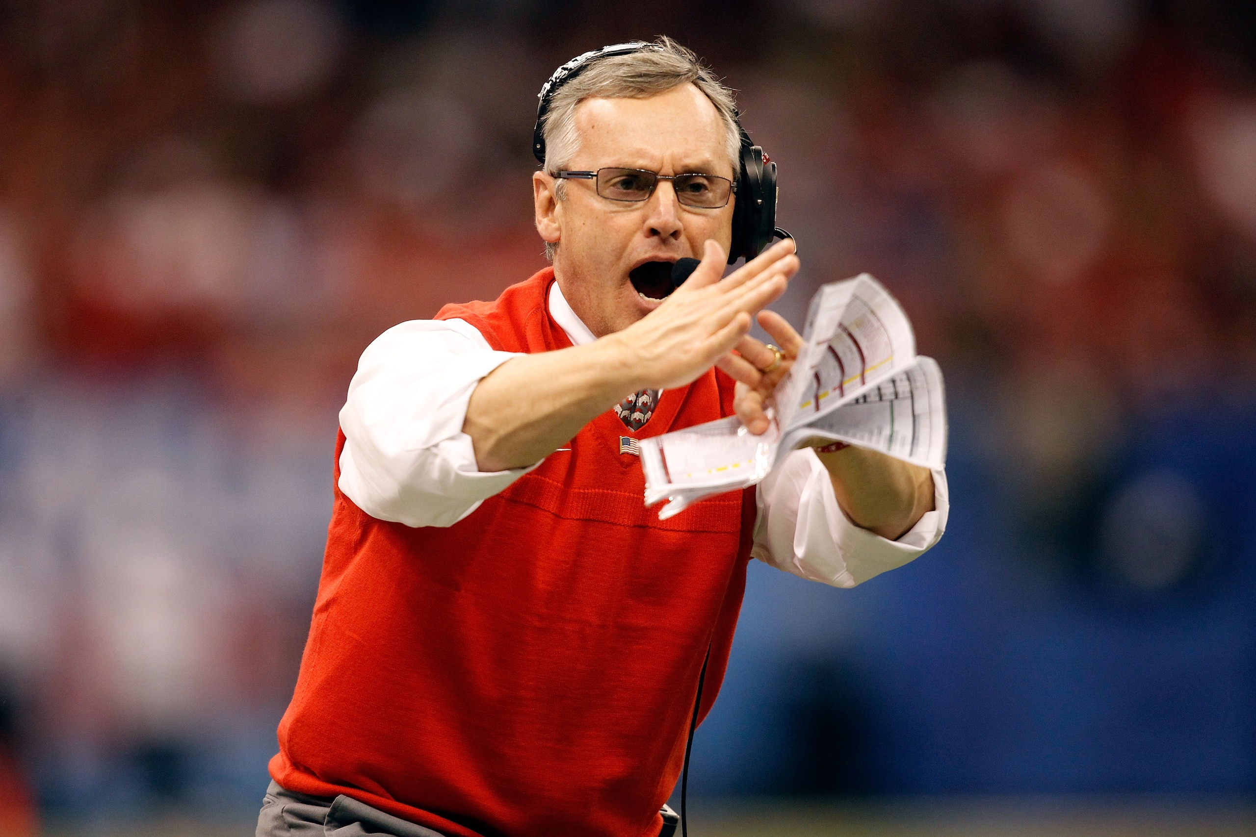 NEW ORLEANS, LA - JANUARY 04:  Head coach Jim Tressel of the Ohio State Buckeyes calls a time out in the first half against the Arkansas Razorbacks during the Allstate Sugar Bowl at the Louisiana Superdome on January 4, 2011 in New Orleans, Louisiana.  (P