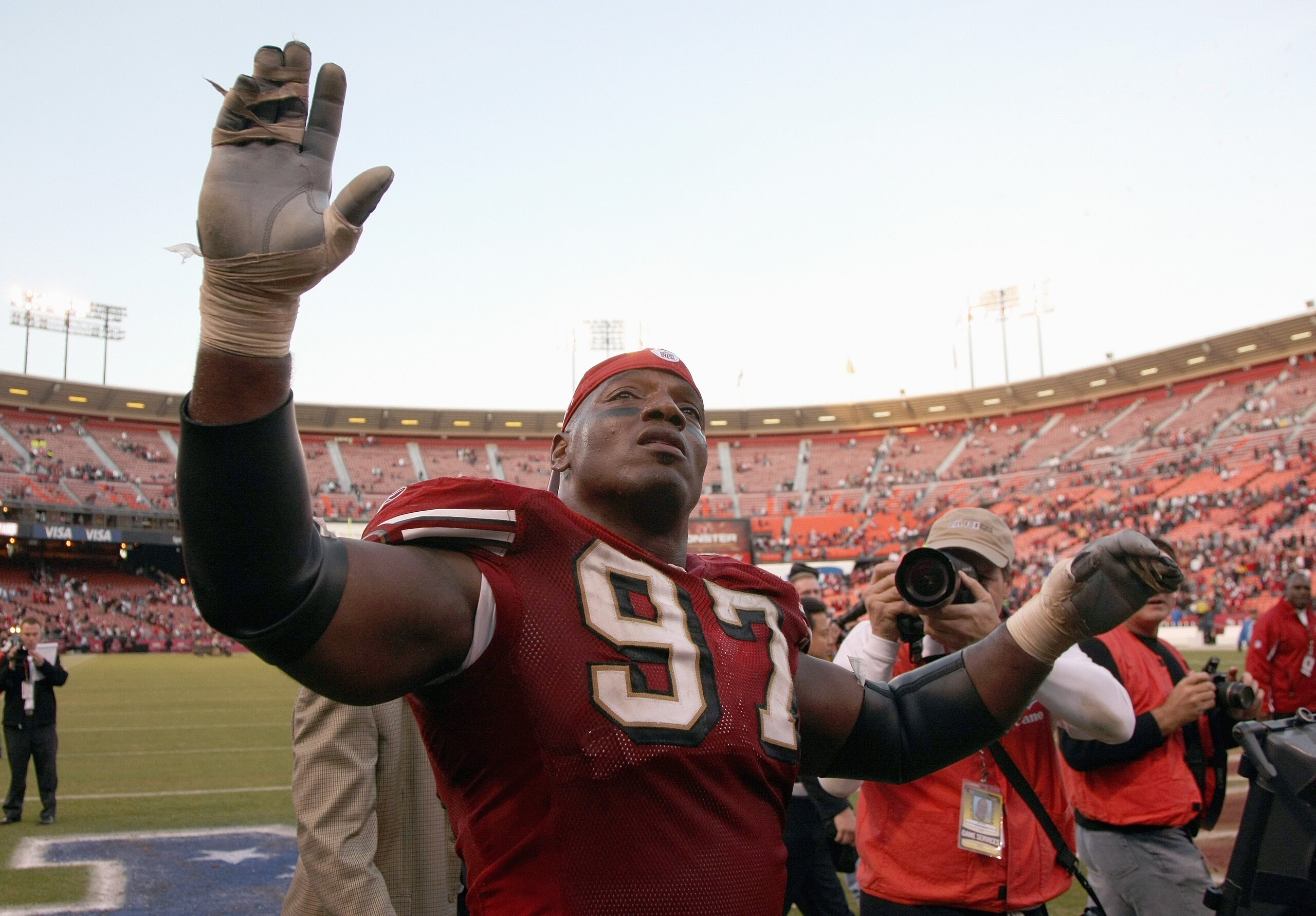 SAN FRANCISCO - DECEMBER 23: Bryant Young #97 of the San Francisco 49ers waves to the fans in his last career home game against the Tampa Bay Buccaneers during an NFL game at Monster Park on December 23, 2007 in San Francisco, California. (Photo by Jed Ja