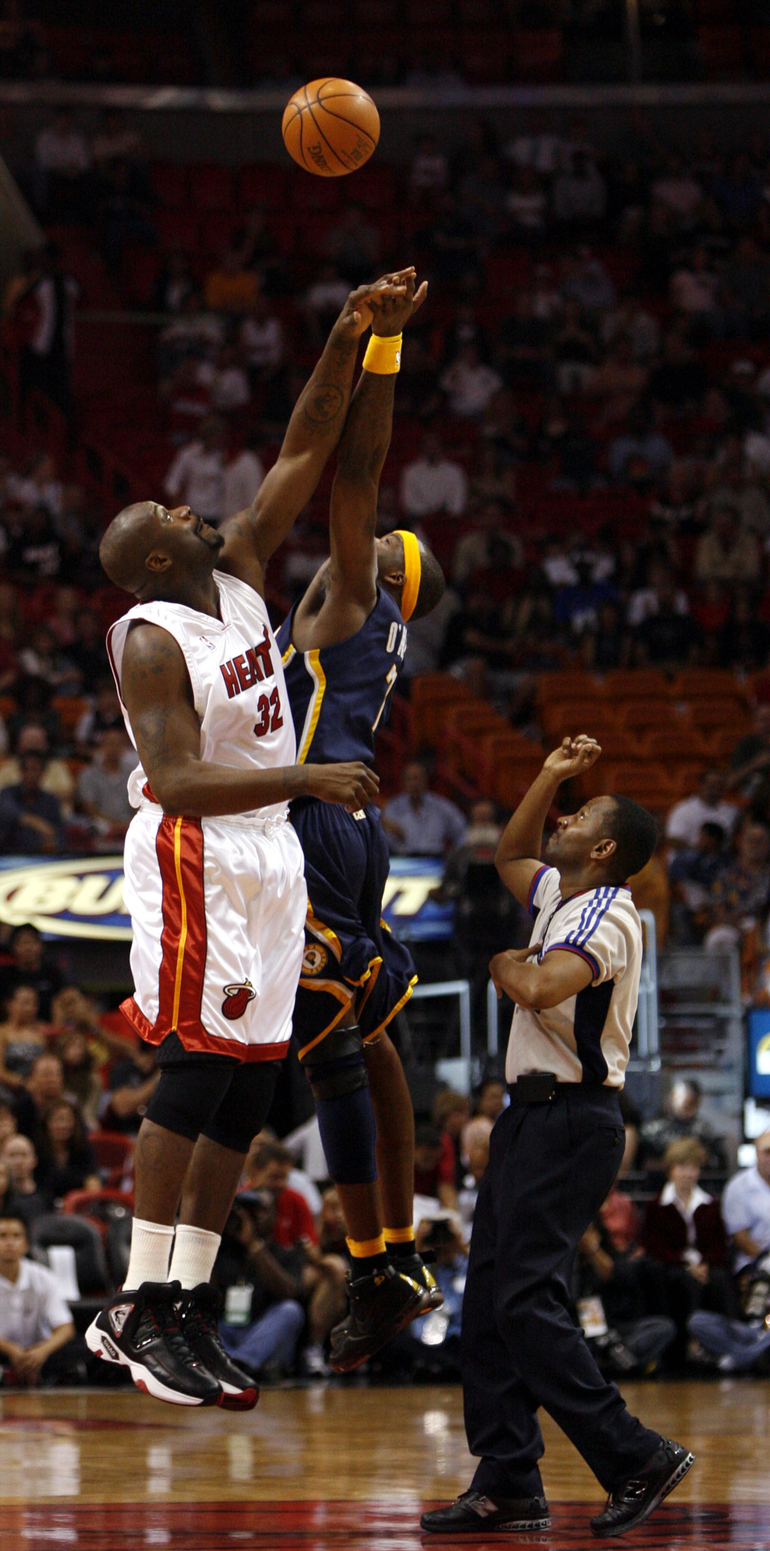 MIAMI - APRIL 13: Shaquille O'Neal #32 of the Miami Heat tips off against Jermaine O'Neal #7 of the Indiana Pacers on April 13, 2007 at the American Airlines Arena in Miami  Florida. NOTE TO USER: User expressly acknowledges and agrees that, by downloadin
