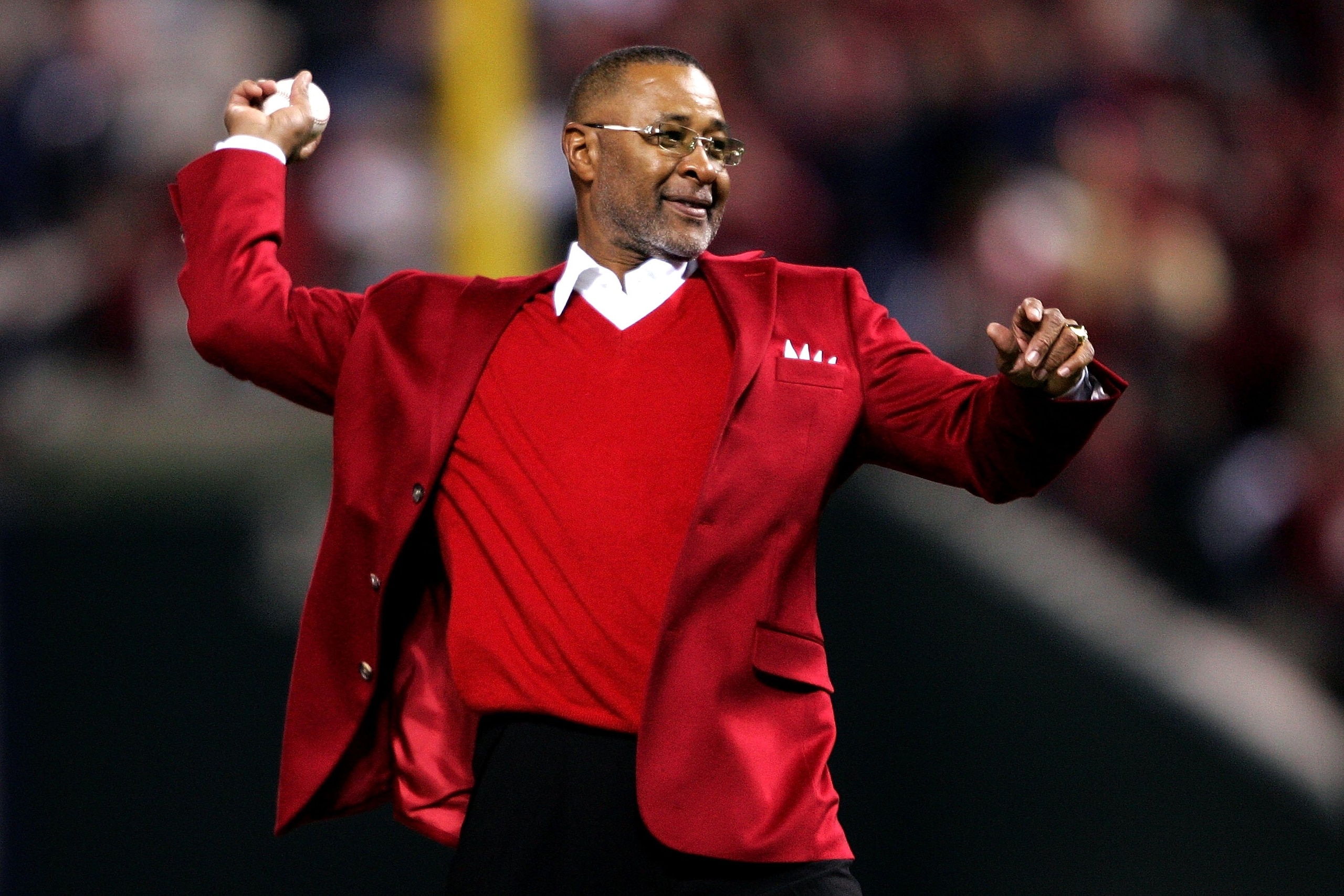 ST LOUIS - OCTOBER 24: Former Cardinal great and Hall of Famer Ozzie Smith throws out the cerimonial first pitch prior to Game Three of 2006 World Series between the Detroit Tigers and the St. Louis Cardinals at Busch Stadium on October 24, 2006 in St. Lo