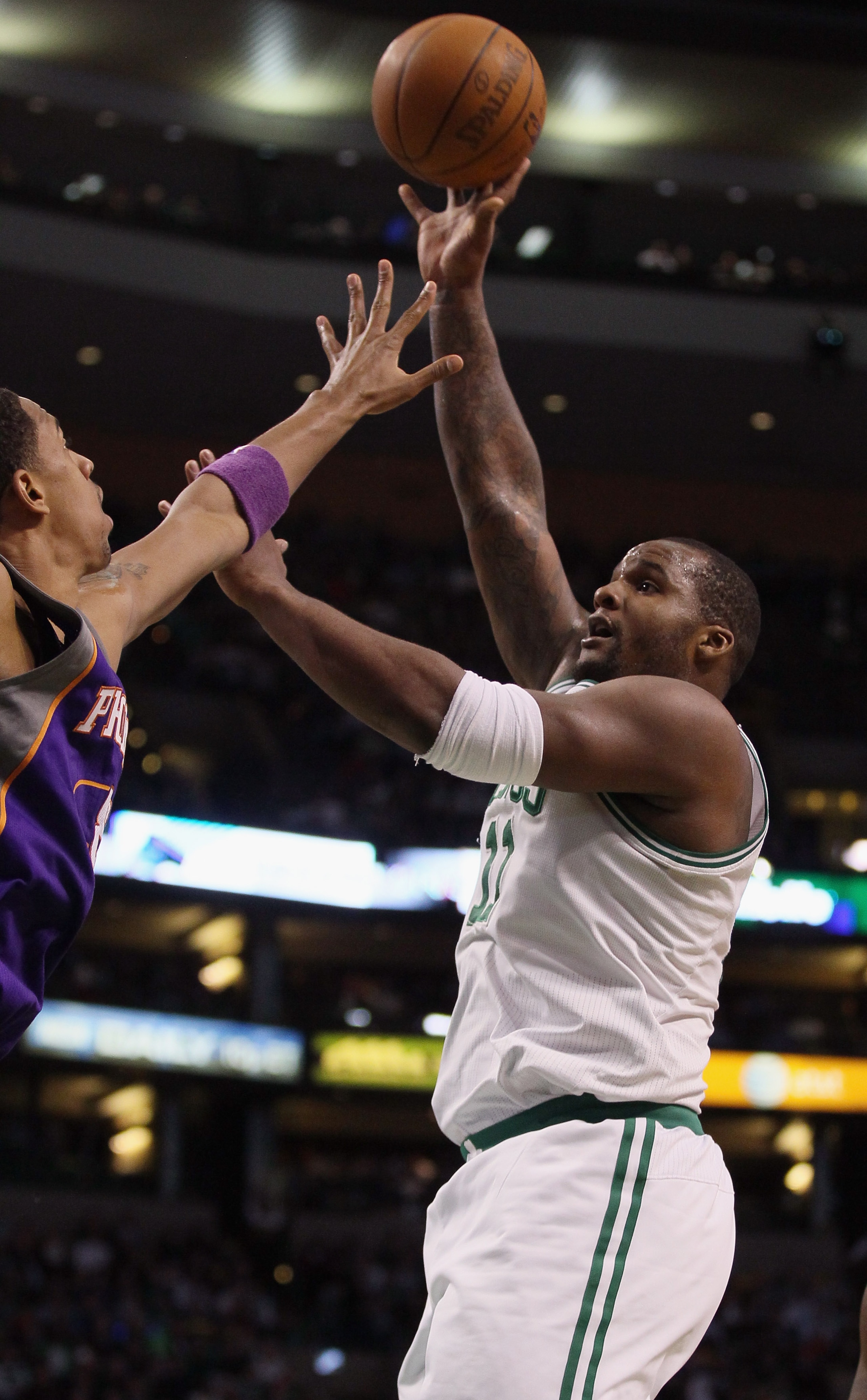 BOSTON, MA - MARCH 02: Glen Davis #11 of the Boston Celtics takes a shot in the first half against the Phoenix Suns on March 2, 2011 at the TD Garden in Boston, Massachusetts.  NOTE TO USER: User expressly acknowledges and agrees that, by downloading and/