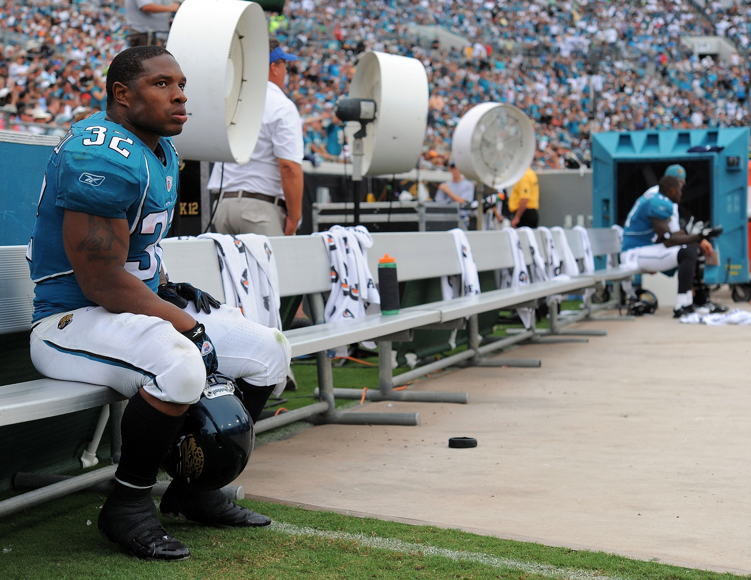 JACKSONVILLE, FL - SEPTEMBER 26:  Running back Maurice Jones-Drew #32 of the Jacksonville Jaguars sits on the sidelines watching his team take on the Philadelphia Eagles at EverBank Field on September 26, 2010 in Jacksonville, Florida. The Eagles defeated