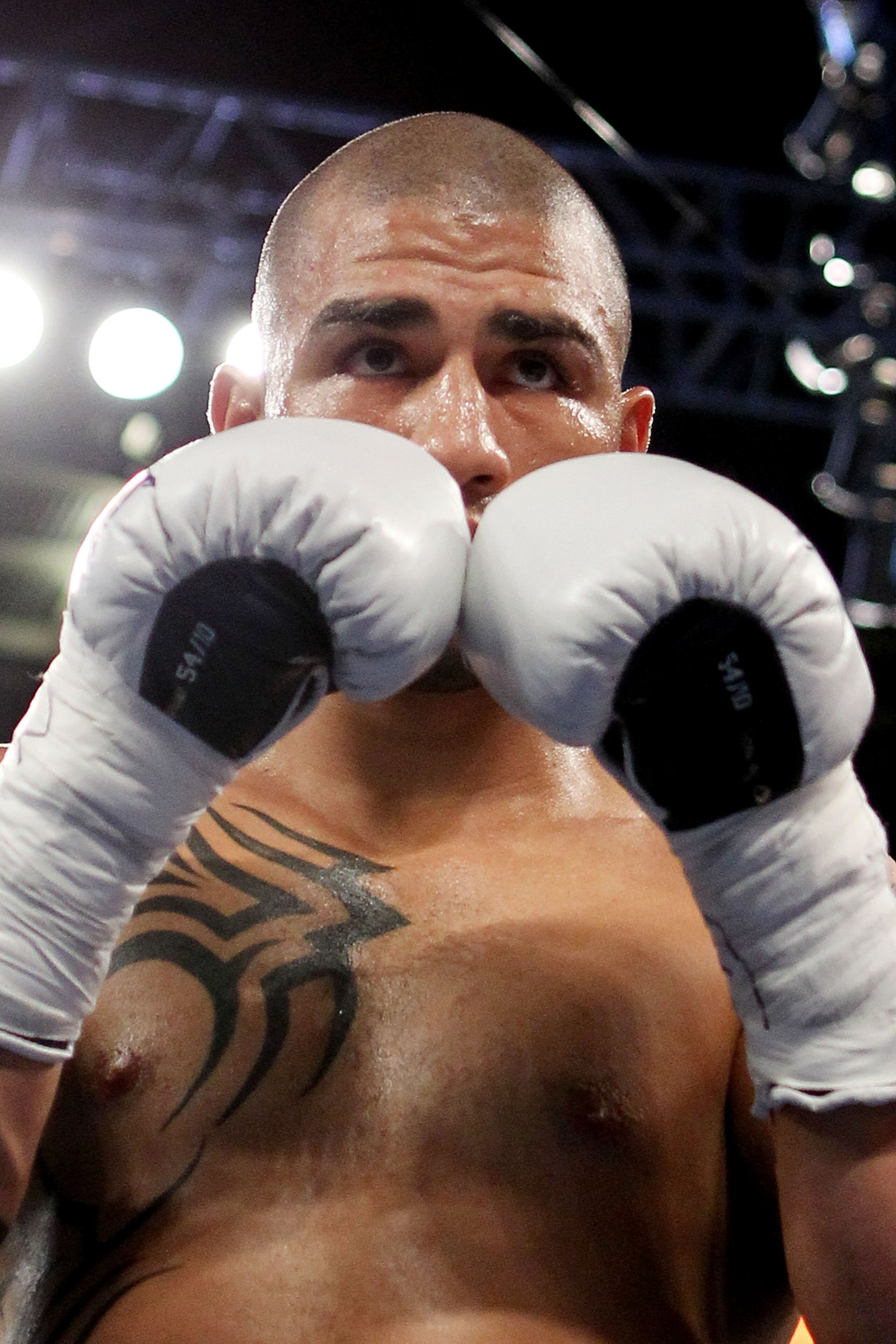 NEW YORK - JUNE 05:  Miguel Cotto of Puerto Rico looks on during the WBA world super welterweight title fight against Yuri Foreman (not pictured) on June 5, 2010 at Yankee Stadium in the Bronx borough of New York City. Cotto wins by TKO in the ninth round