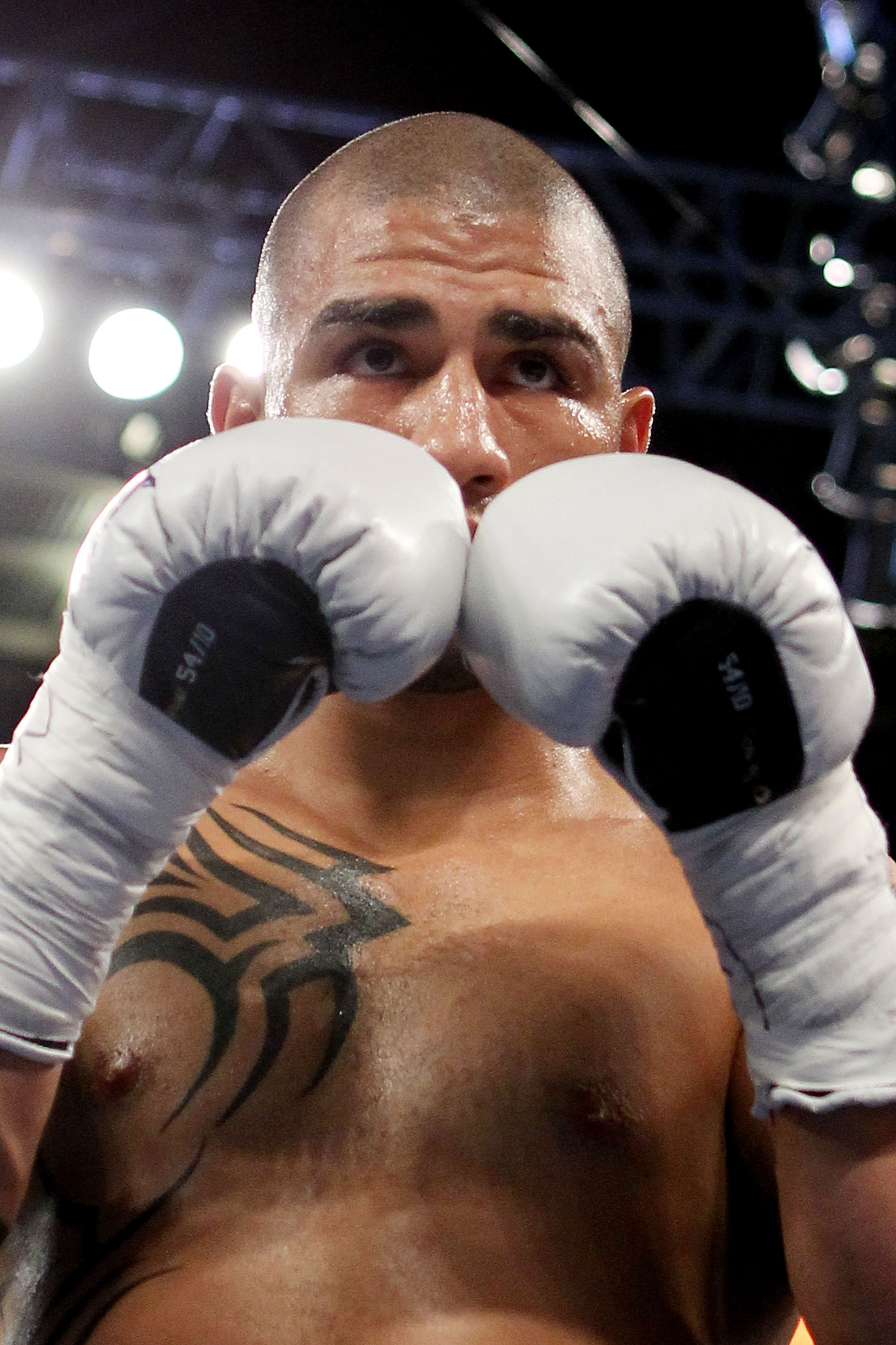 NEW YORK - JUNE 05:  Miguel Cotto of Puerto Rico looks on during the WBA world super welterweight title fight against Yuri Foreman (not pictured) on June 5, 2010 at Yankee Stadium in the Bronx borough of New York City. Cotto wins by TKO in the ninth round