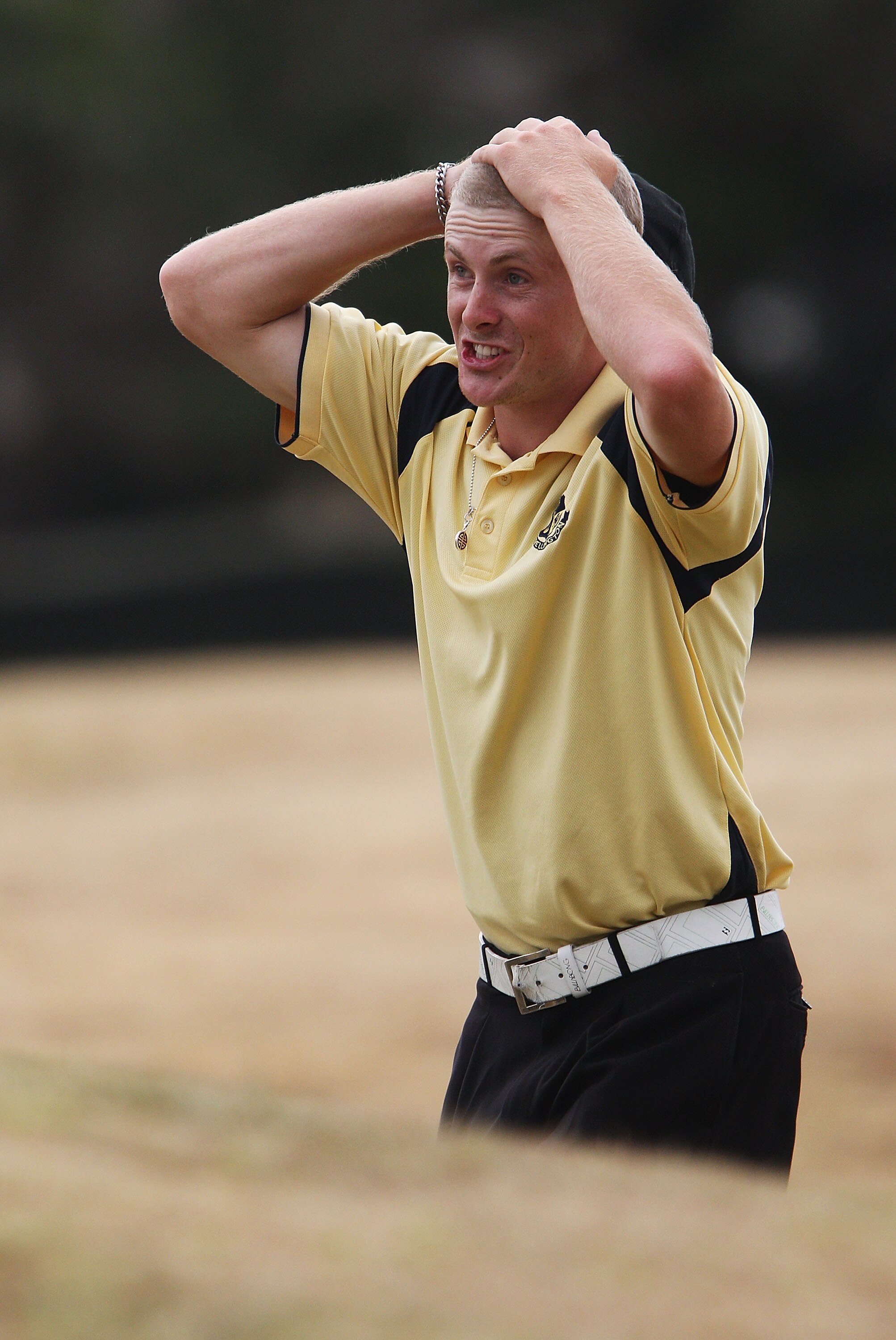 PARAPARAUMU, NEW ZEALAND - DECEMBER 11:  James Betts of Wellington reacts after a bad shot on the 18th hole during the New Zealand Men's Interprovincial Final at Paraparaumu Beach Golf Club on December 11, 2010 in Paraparaumu, New Zealand.  (Photo by Hage