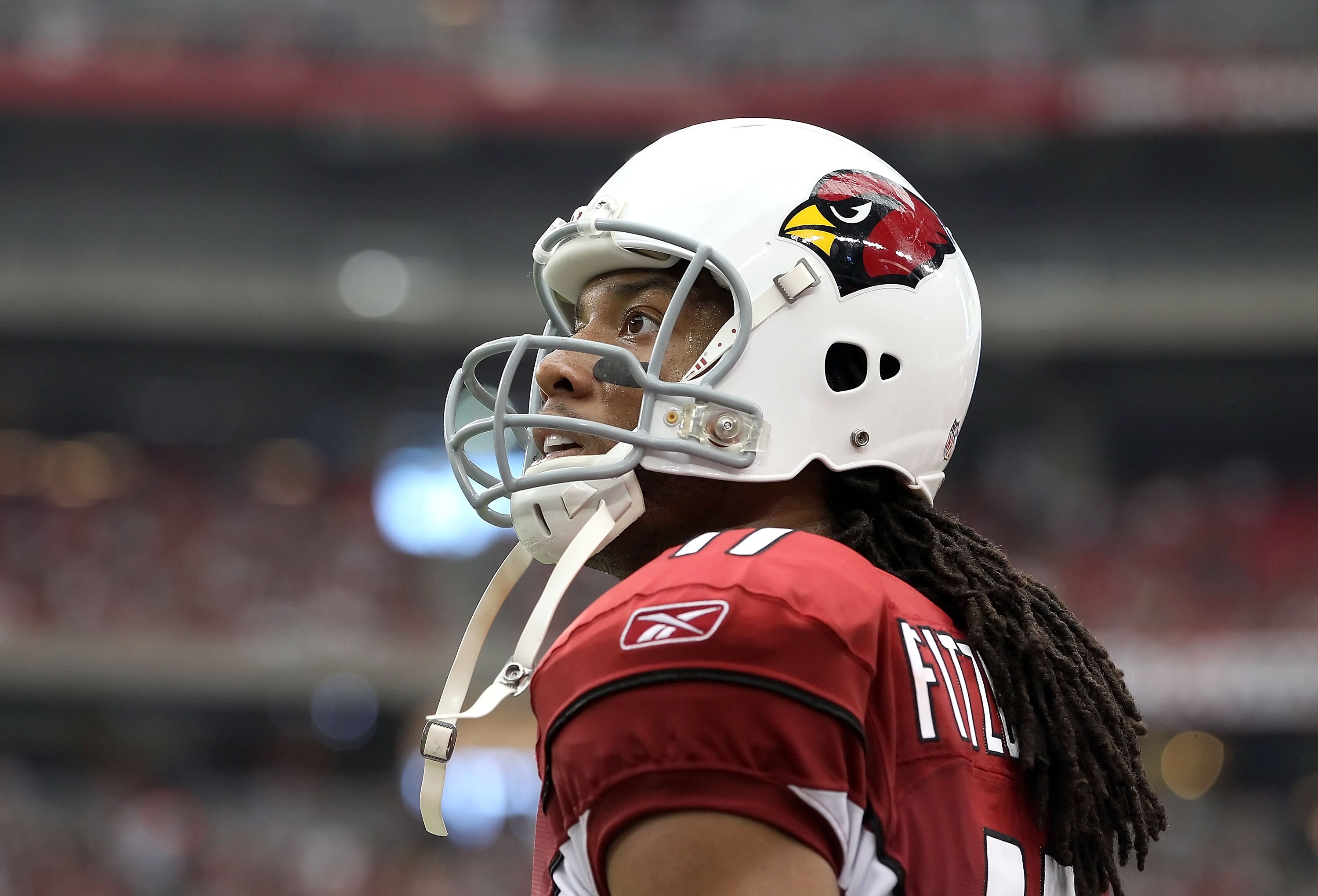 GLENDALE, AZ - SEPTEMBER 26:  Wide receiver Larry Fitzgerald #11 of the Arizona Cardinals during the NFL game against the Oakland Raiders at the University of Phoenix Stadium on September 26, 2010 in Glendale, Arizona.  The Cardinals defeated the Raiders