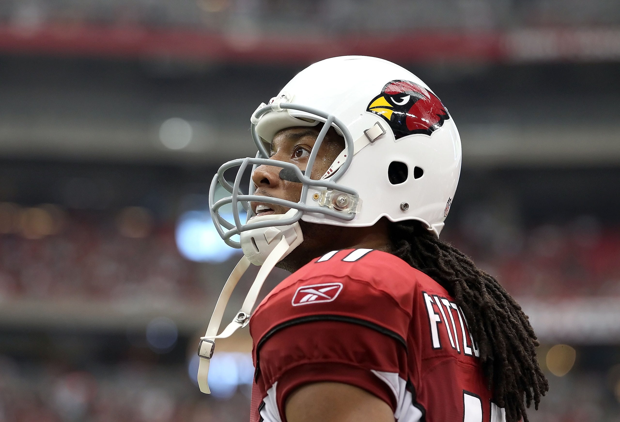 GLENDALE, AZ - SEPTEMBER 26:  Wide receiver Larry Fitzgerald #11 of the Arizona Cardinals during the NFL game against the Oakland Raiders at the University of Phoenix Stadium on September 26, 2010 in Glendale, Arizona.  The Cardinals defeated the Raiders