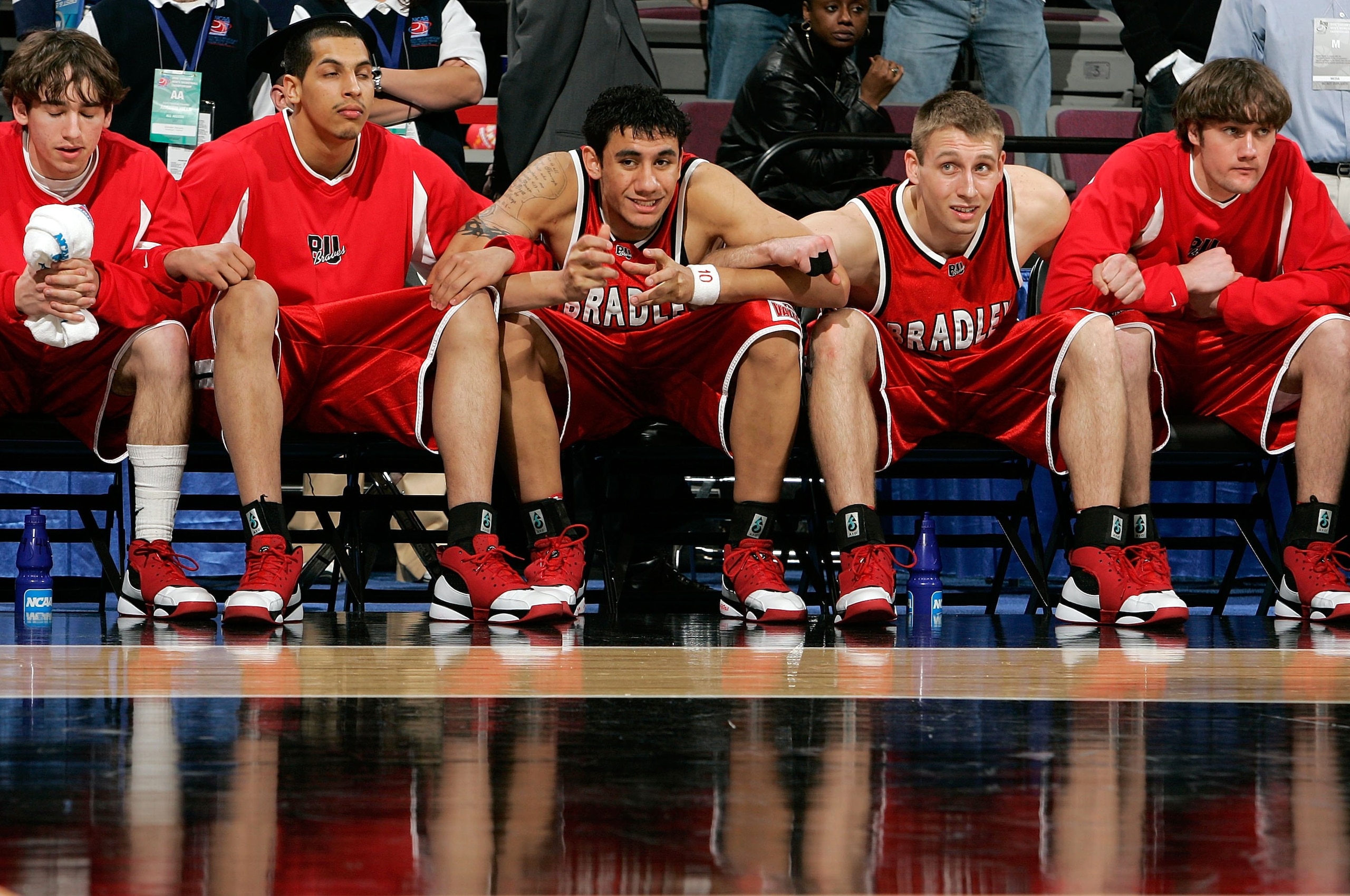 AUBURN HILLS, MI - MARCH 17:  J.J. Tauai #10 (C) of the Bradley Braves and teammates await the outcome in the second half of  First Round of the 2006 NCAA Men's Basketball Tournament against the Kansas Jayhawks at The Palace of Auburn Hills on March 17, 2