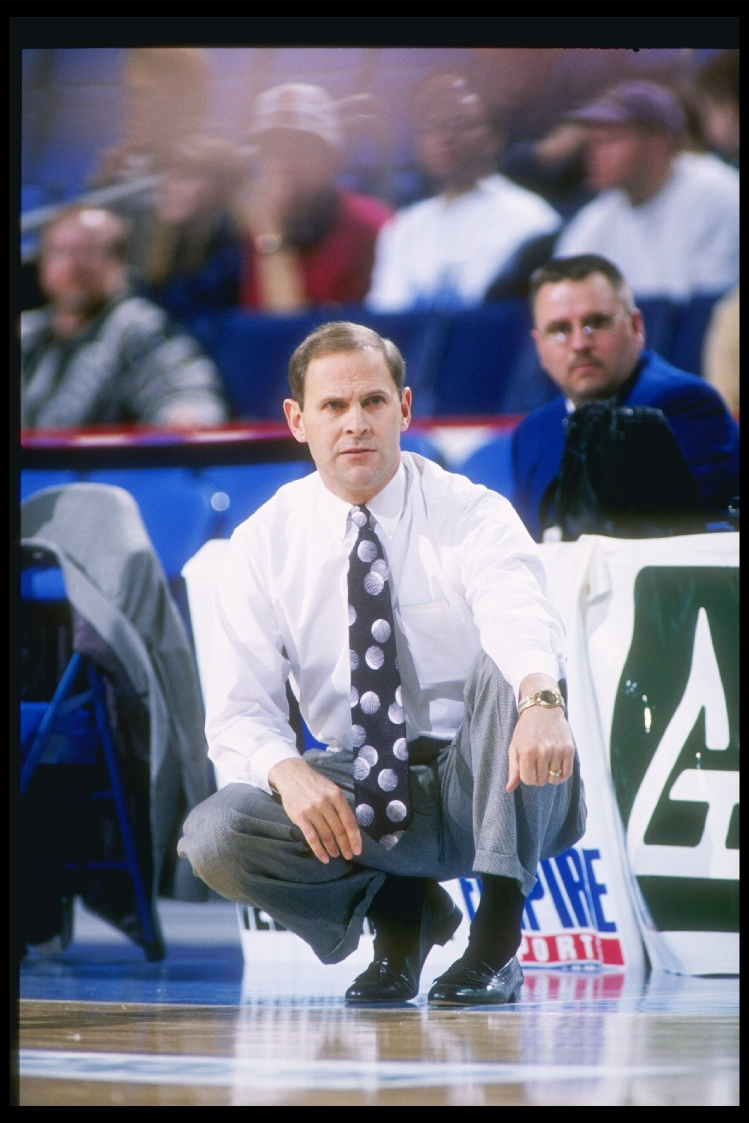 21 Dec 1996:  Coach John Beilein of the Canisius Griffs watches his players during a game against the North Carolina at Charlotte 49ers at the Marine Midland Arena in Buffalo, New York.  North Carolina at Charlotte won the game 54-51. Mandatory Credit: Ri