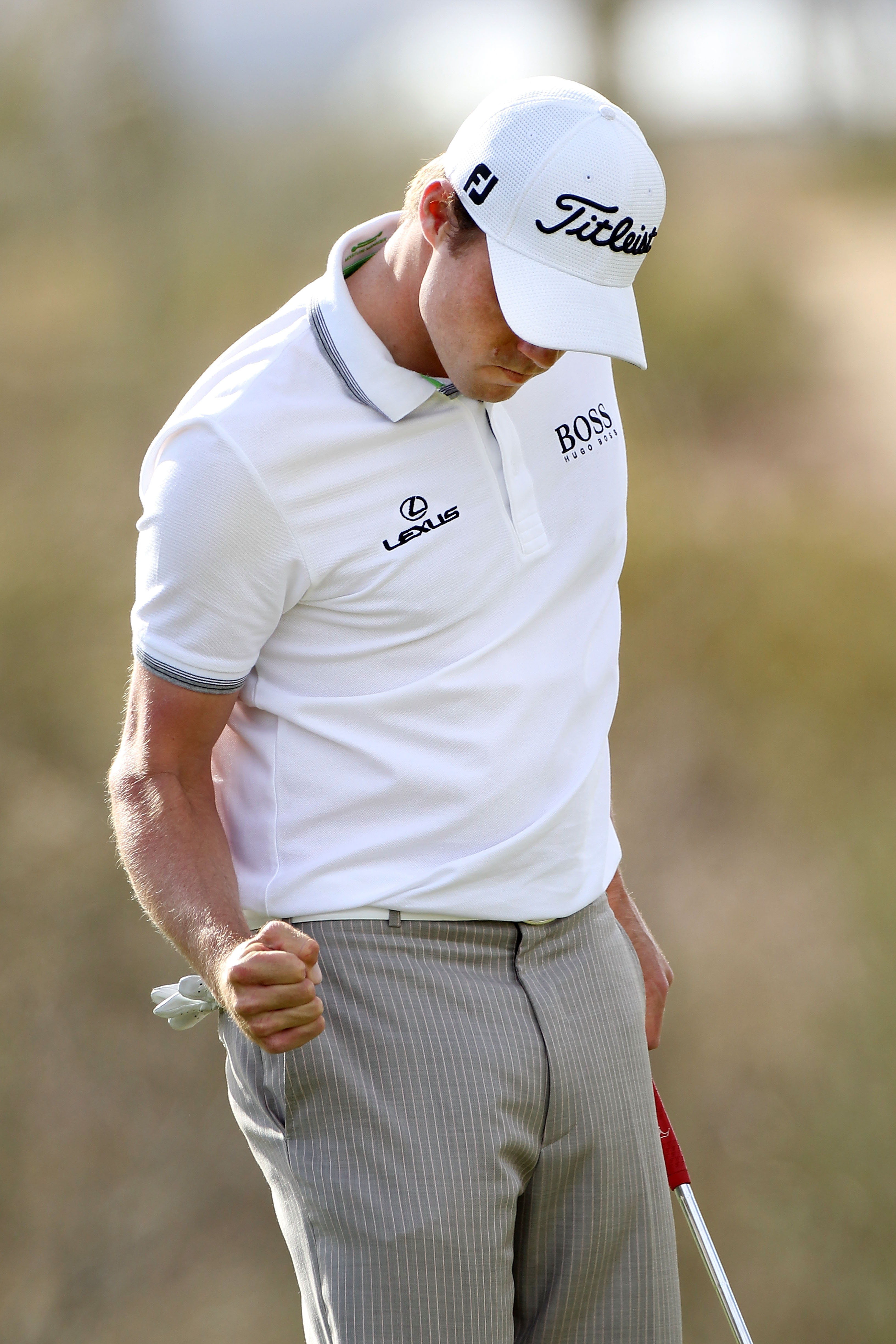 MARANA, AZ - FEBRUARY 25:  Nick Watney reacts on the 18th hole during the third round of the Accenture Match Play Championship at the Ritz-Carlton Golf Club on February 25, 2011 in Marana, Arizona.  (Photo by Sam Greenwood/Getty Images)