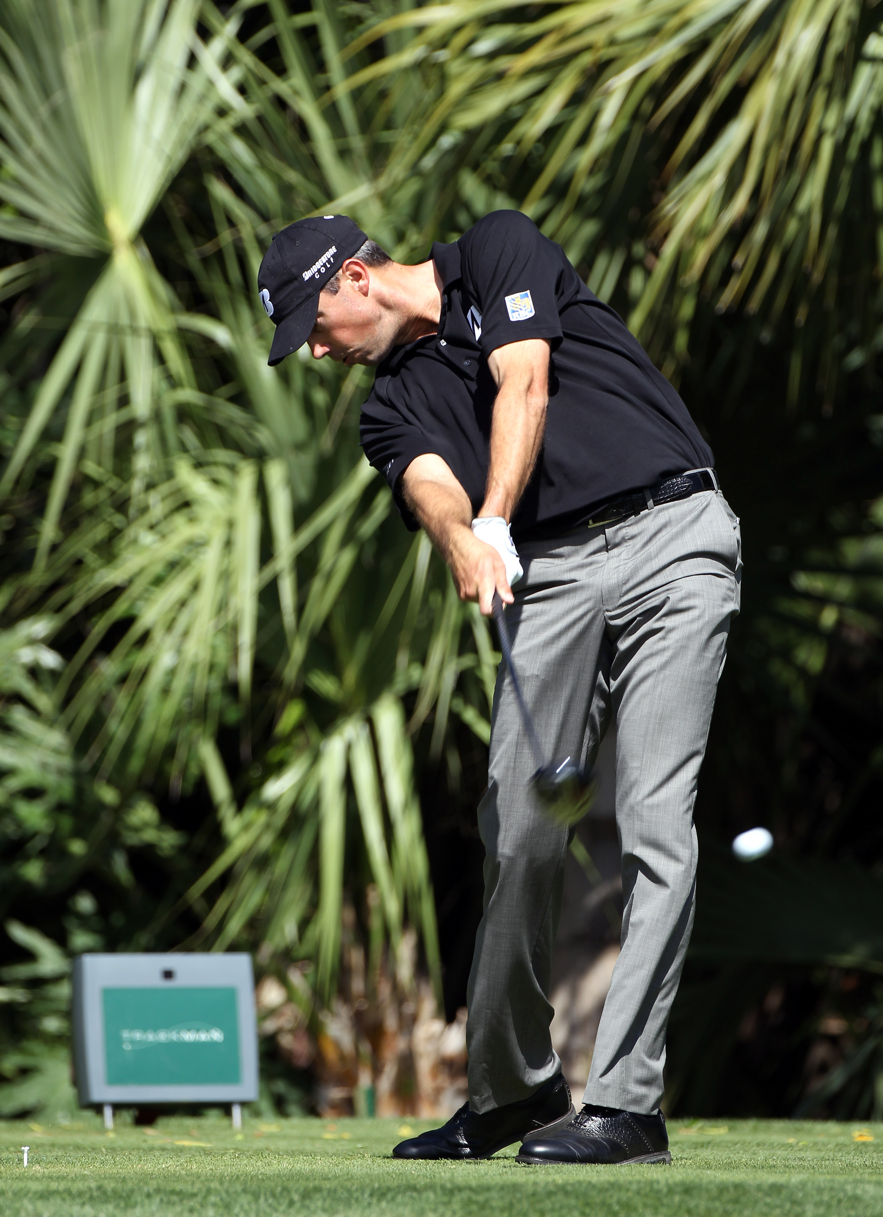 PALM BEACH GARDENS, FL - MARCH 04:  Matt Kuchar plays a shot on the 3rd hole during the second round of The Honda Classic at PGA National Resort and Spa on March 4, 2011 in Palm Beach Gardens, Florida.  (Photo by Sam Greenwood/Getty Images)