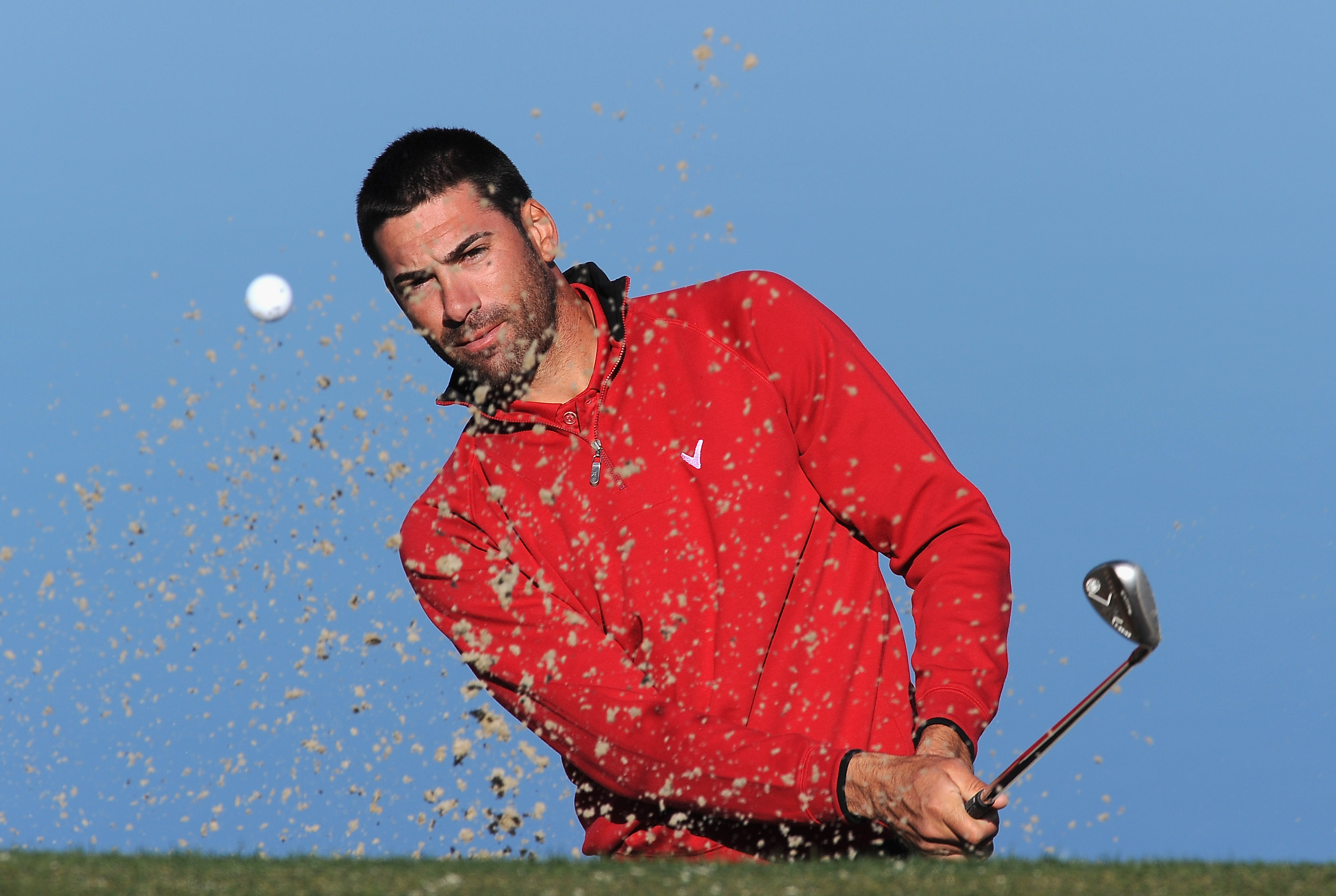 MARANA, AZ - FEBRUARY 22:  Alvaro Quiros of Spain plays a bunker shot during practice prior to the start of the World Golf Championships-Accenture Match Play Championship held at The Ritz-Carlton Golf Club, Dove Mountain on February 22, 2011 in Marana, Ar