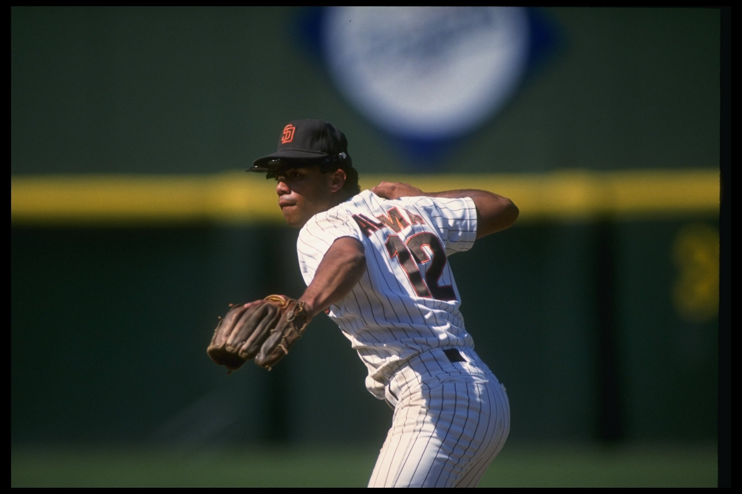 1990:  First baseman Roberto Alomar of the San Diego Padres throws the ball during a game at Jack Murphy Stadium in San Diego, California. Mandatory Credit: Stephen Dunn  /Allsport