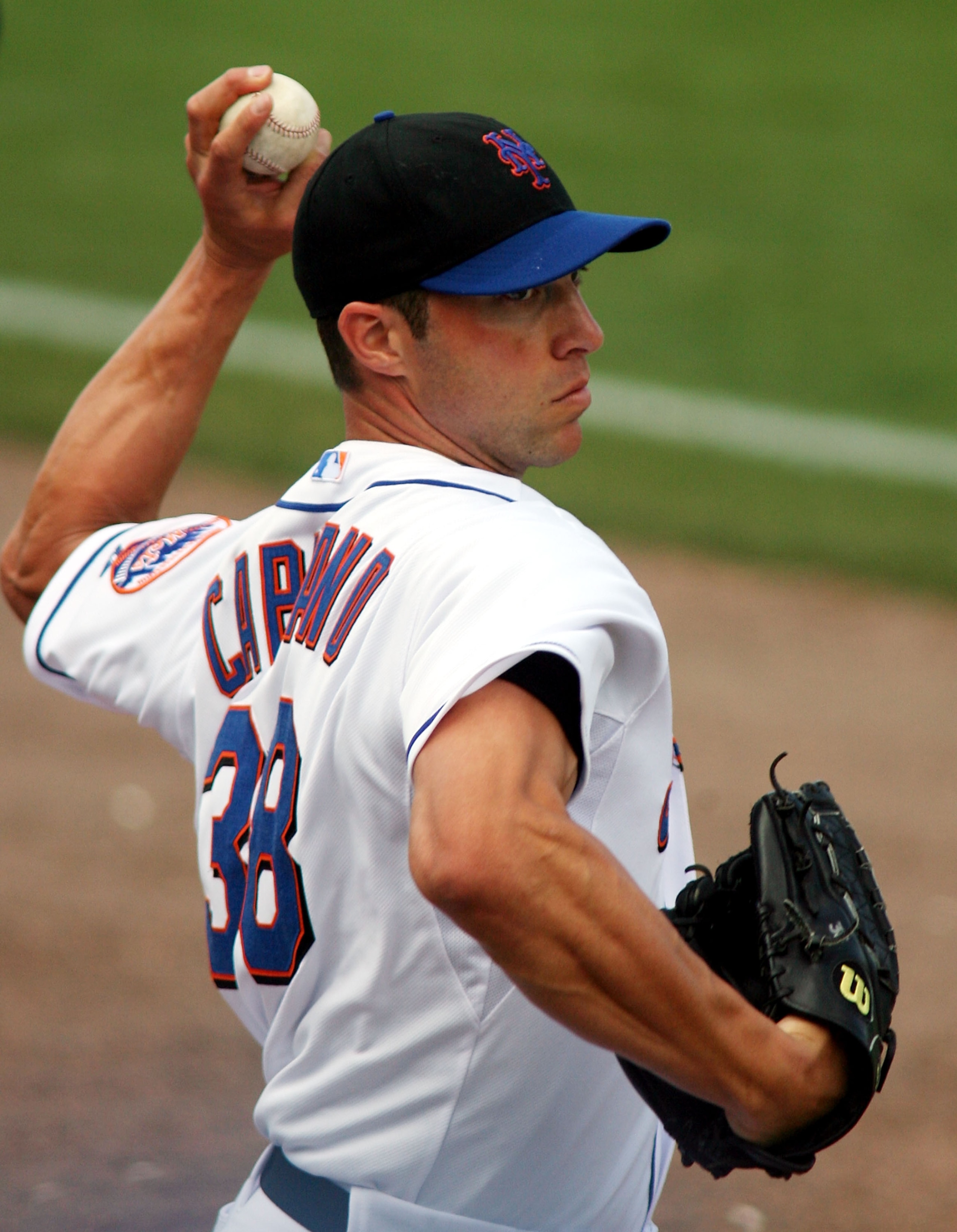 PORT ST. LUCIE, FL - MARCH 03: Pitcher Chris Capuano #38 of the New York Mets throws against the St. Louis Cardinals at Digital Domain Park on March 3, 2011 in Port St. Lucie, Florida. (Photo by Marc Serota/Getty Images) PORT ST. LUCIE, FL - MARCH 03: Pitcher Chris Capuano #38 of the New York Mets throws against the St. Louis Cardinals at Digital Domain Park on March 3, 2011 in Port St. Lucie, Florida. (Photo by Marc Serota/Getty Images)