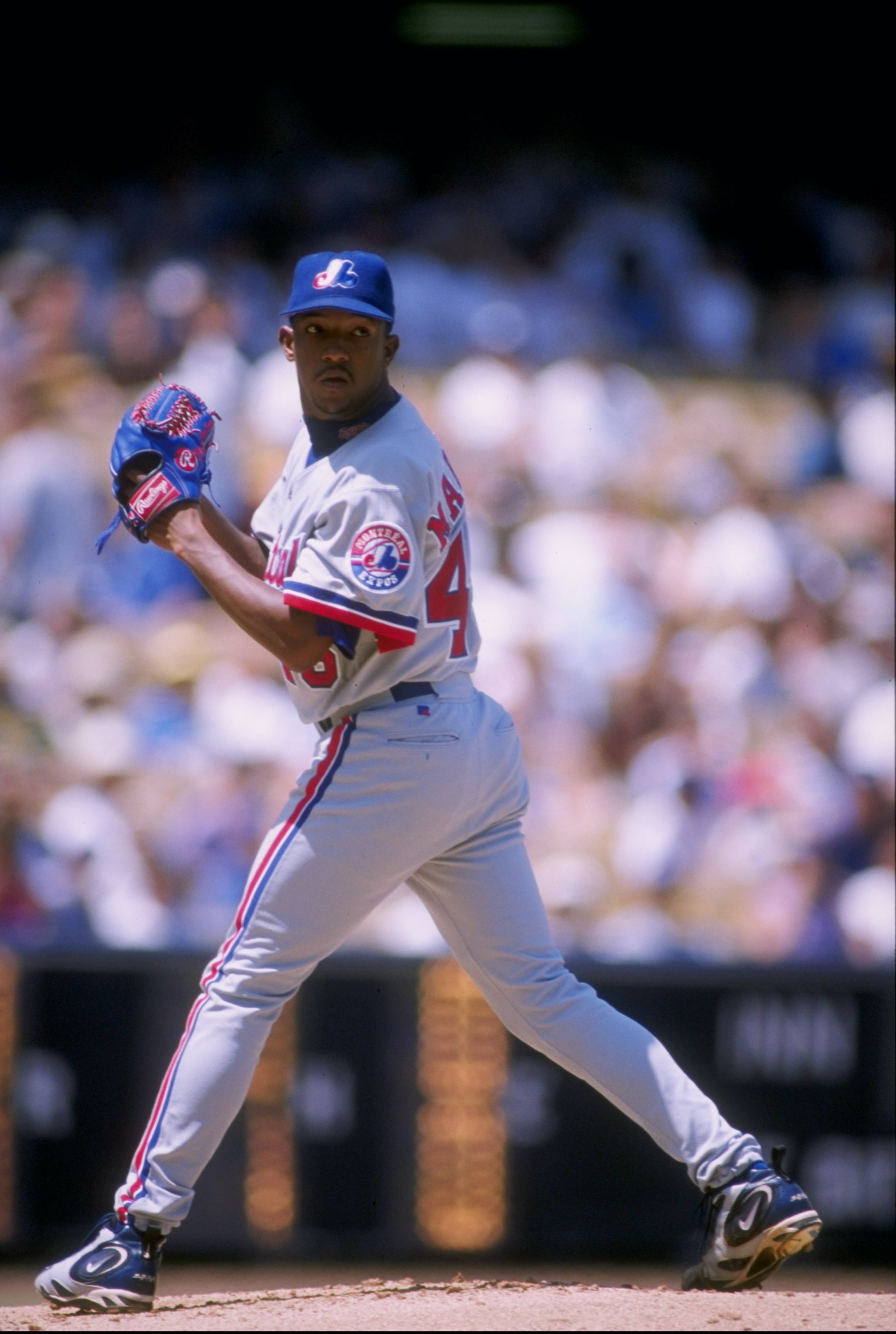 14 Aug 1997: Pitcher Pedro Martinez of the Montreal Expos winds up to throw a pitch during the Expos 1-0 loss to the Los Angeles Dodgers at Dodger Stadium in Los Angeles, California