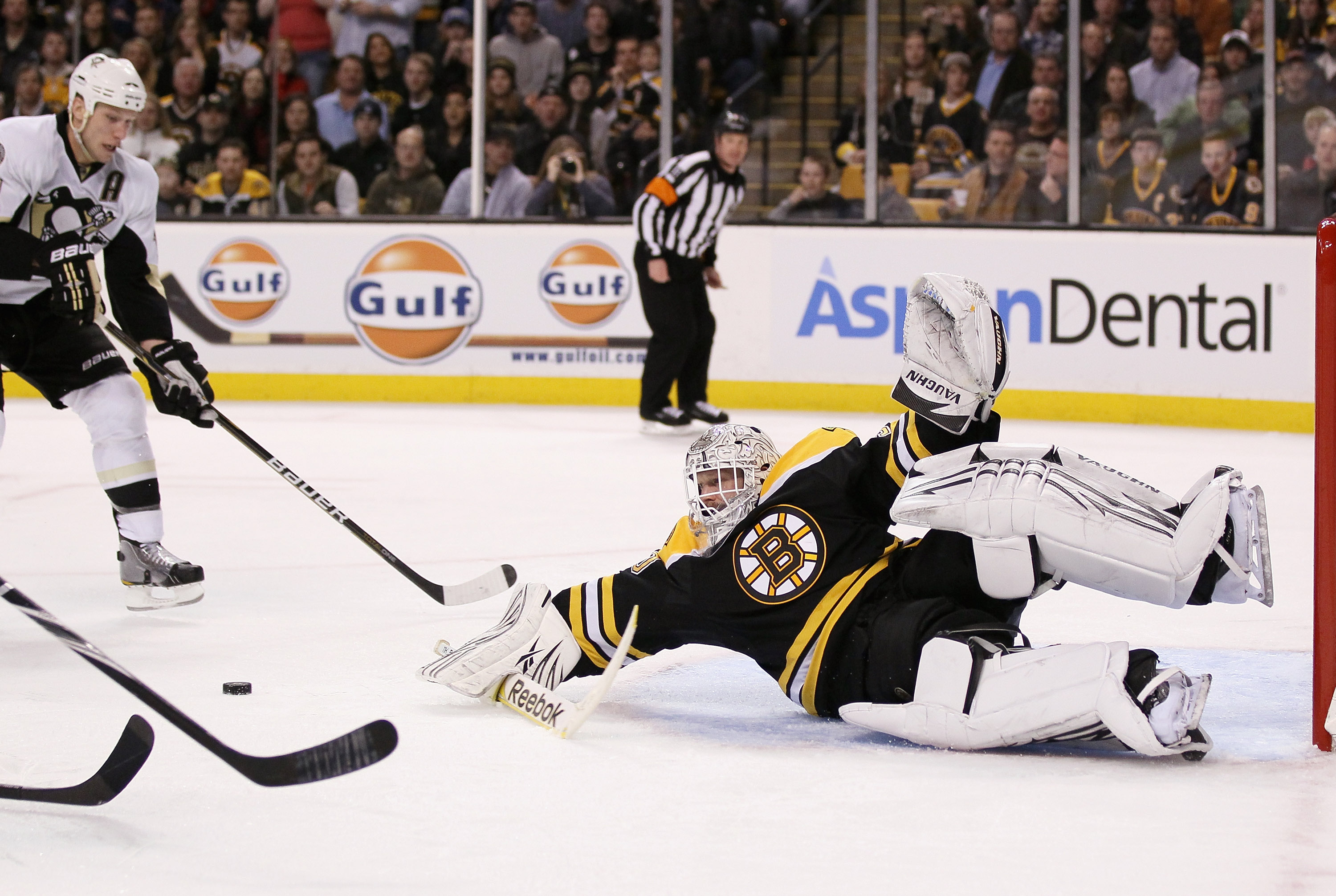 BOSTON, MA - MARCH 05: Tim Thomas #30 of the Boston Bruins is unable to stop a pass and shot by to Jordan Staal #11 of the Pittsburgh Penguins on March 5, 2011 at the TD Garden in Boston, Massachusetts. (Photo by Elsa/Getty Images)
