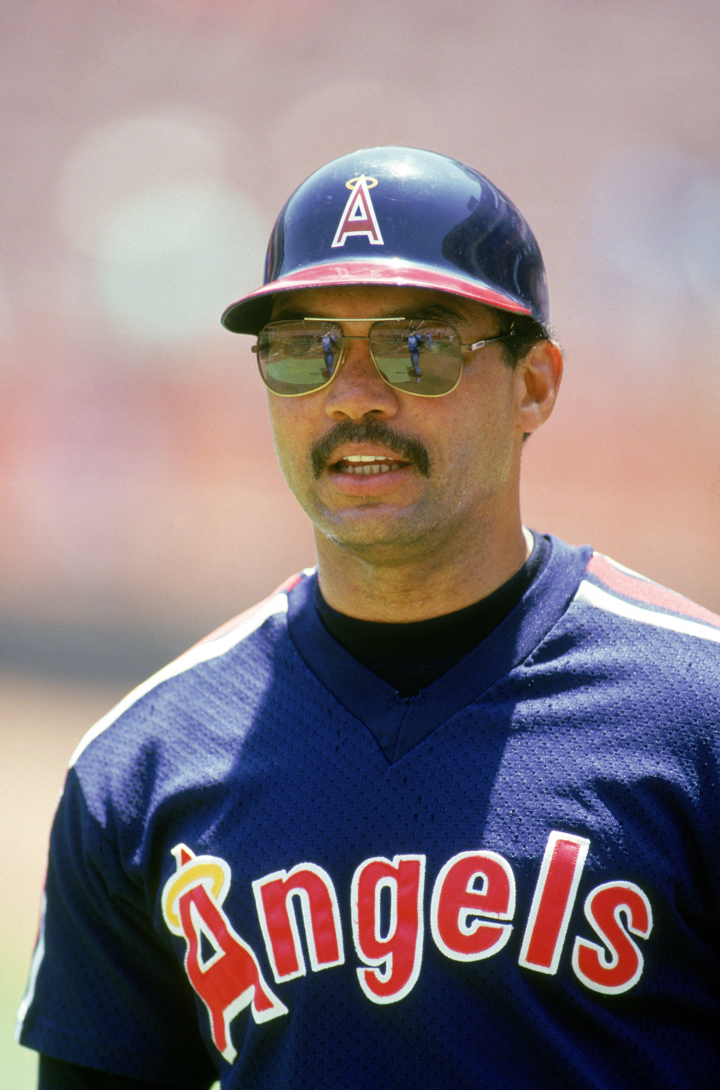 ANAHEIM, CA - 1986:  Reggie Jackson #44 of the California Angels stands on the field before a 1986 MLB game at Angel Stadium in Anaheim, California. (Photo by Rick Stewart/Getty Images)