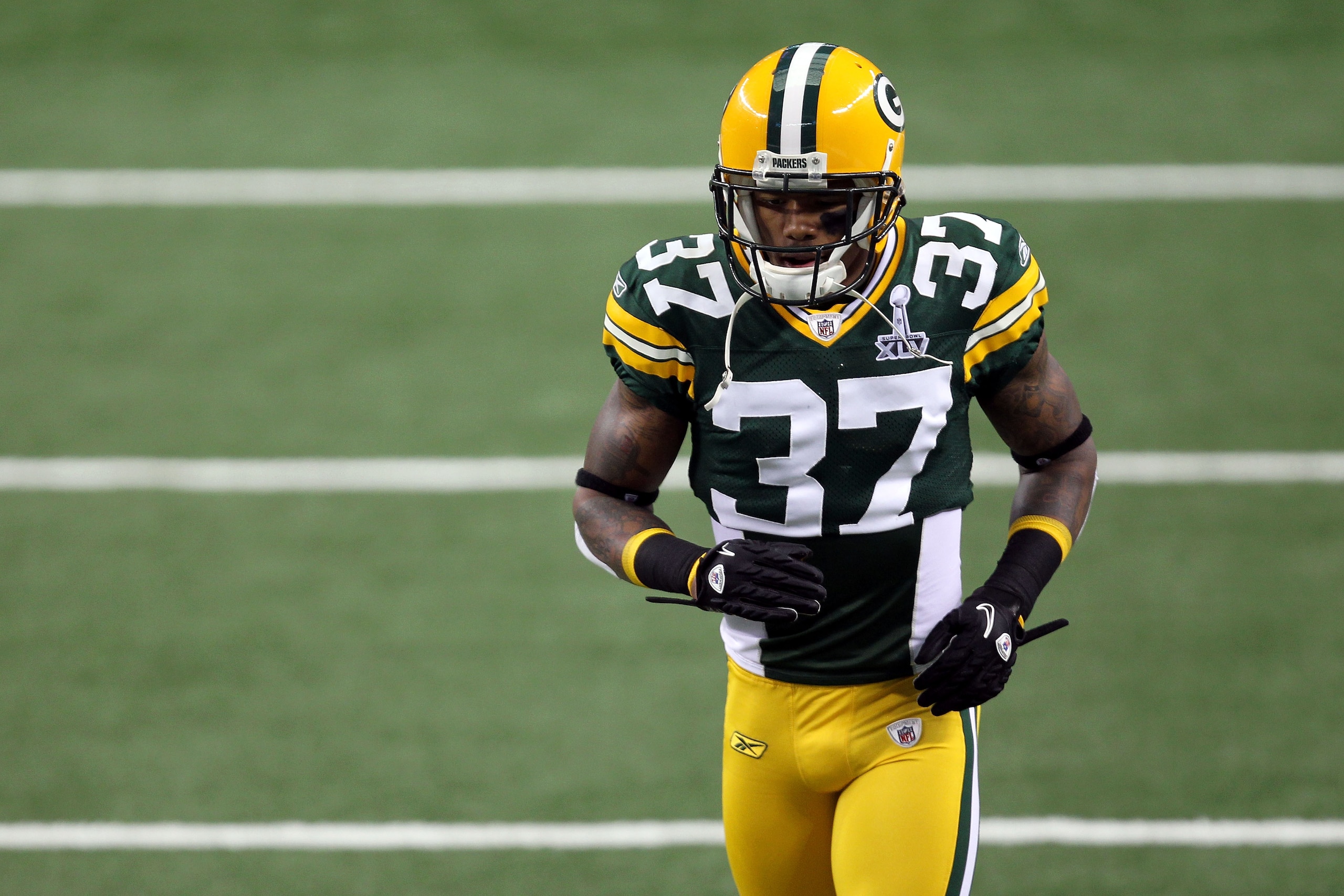 ARLINGTON, TX - FEBRUARY 06:  Sam Shields #37 of the Green Bay Packers runs on the field during warm ups against the Pittsburgh Steelers during Super Bowl XLV at Cowboys Stadium on February 6, 2011 in Arlington, Texas. The {ackers won 31-25. (Photo by Mik