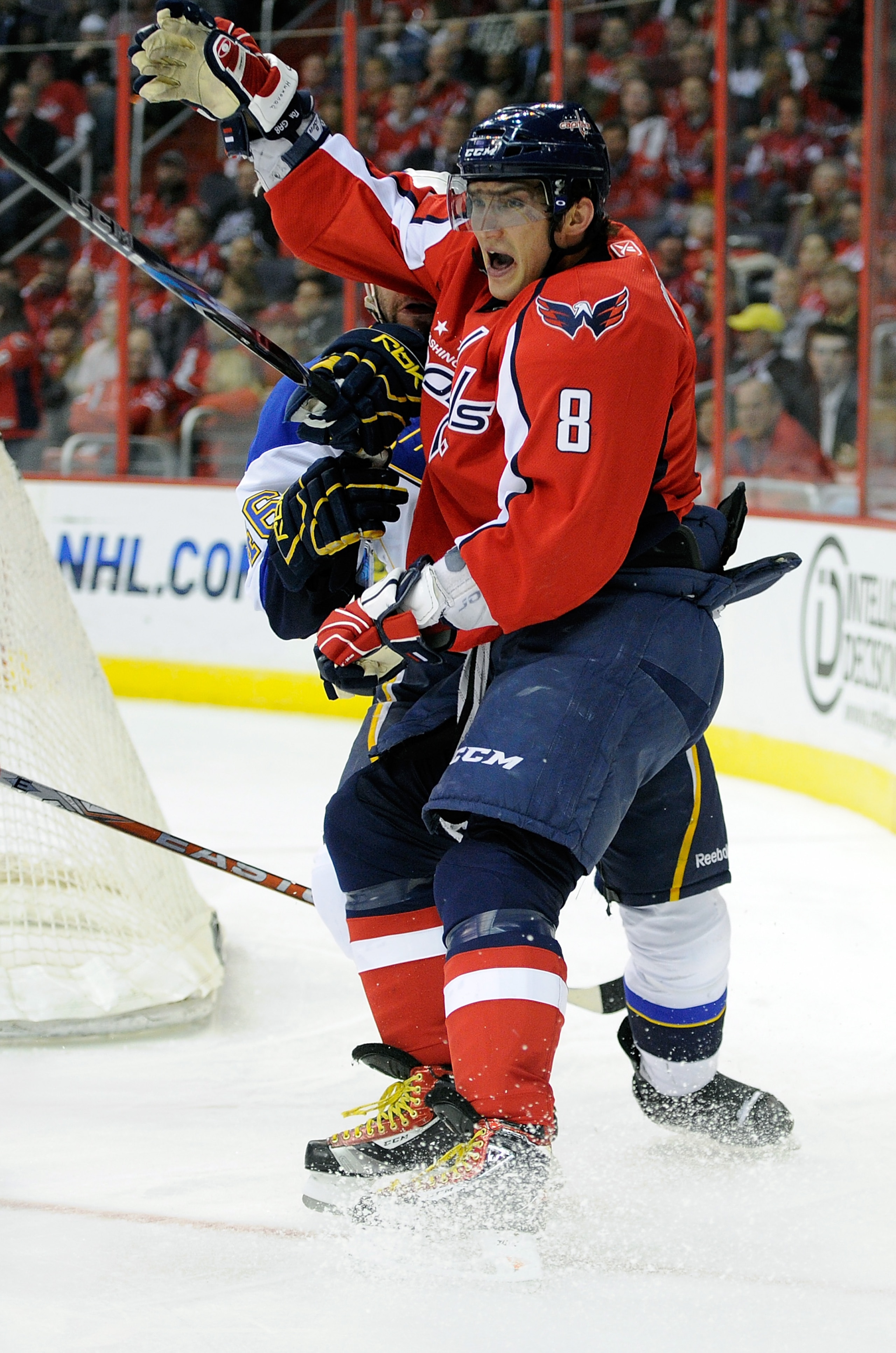 WASHINGTON, DC - MARCH 03:  Alex Ovechkin #8 of the Washington Capitals reacts as his stick is held by Roman Polak #46 of the St. Louis Blues at the Verizon Center on March 3, 2011 in Washington, DC.  (Photo by Greg Fiume/Getty Images)