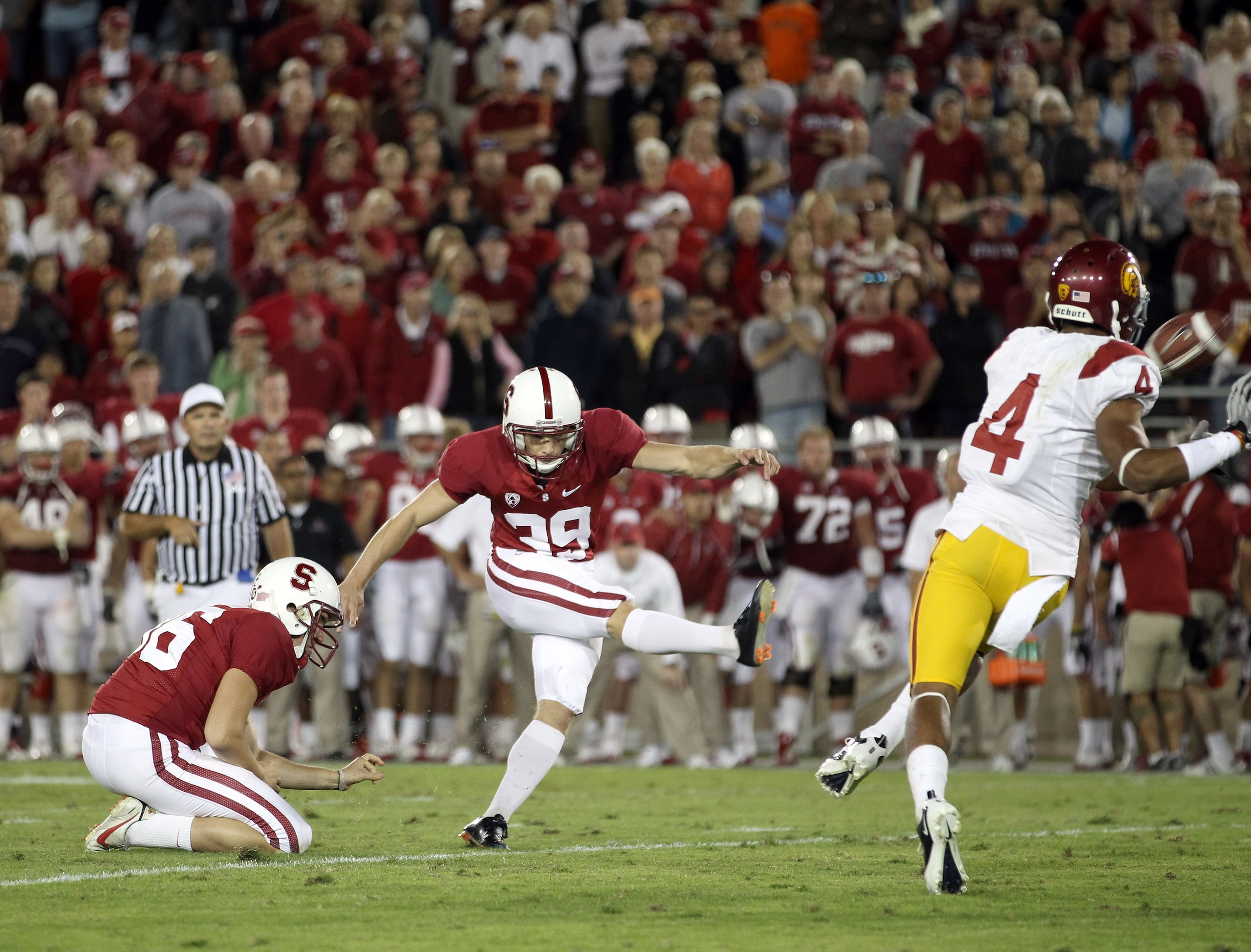 PALO ALTO, CA - OCTOBER 09:  Nate Whitaker #39 of the Stanford Cardinal kicks a field goal to beat the USC Trojans 37-35 at Stanford Stadium on October 9, 2010 in Palo Alto, California.  (Photo by Ezra Shaw/Getty Images)