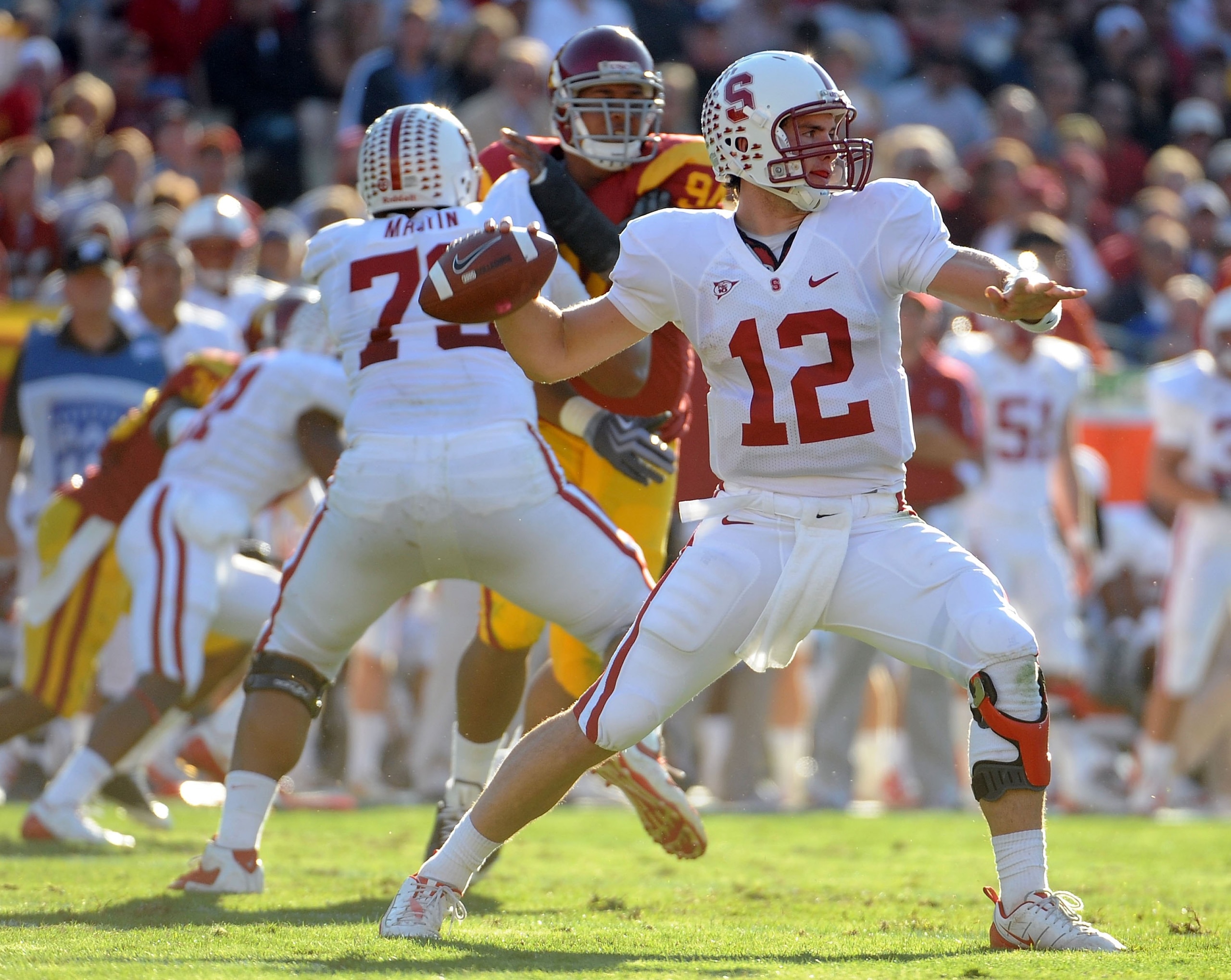 LOS ANGELES, CA - NOVEMBER 14:  Andrew Luck #12 of the Stanford Cardinals passes against the USC Trojans during the second half at the Los Angeles Memorial Coliseum on November 14, 2009 in Los Angeles, California. Stanford won 55-21.  (Photo by Harry How/
