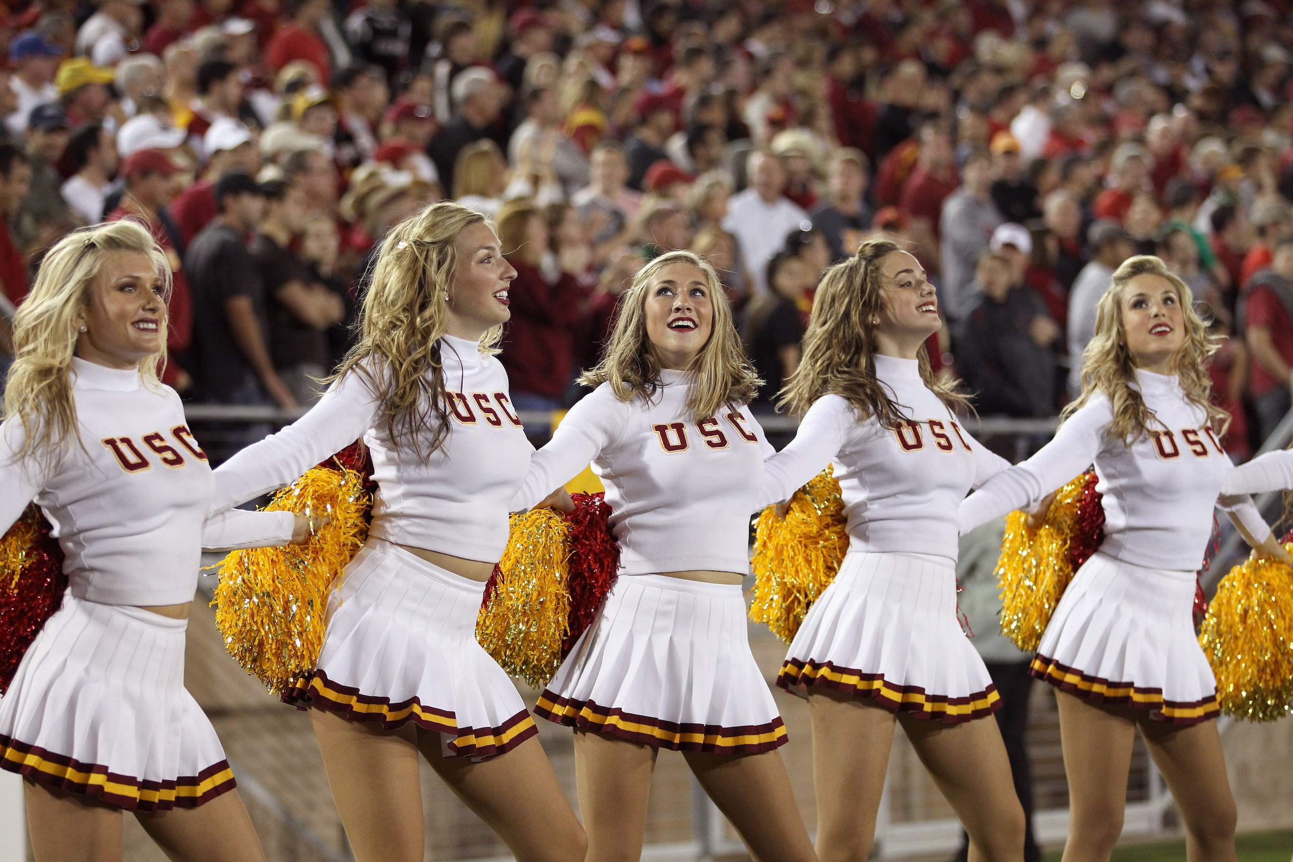 PALO ALTO, CA - OCTOBER 09:  The USC Trojan cheerleaders cheer for their team during their game against the Stanford Cardinal at Stanford Stadium on October 9, 2010 in Palo Alto, California.  (Photo by Ezra Shaw/Getty Images)