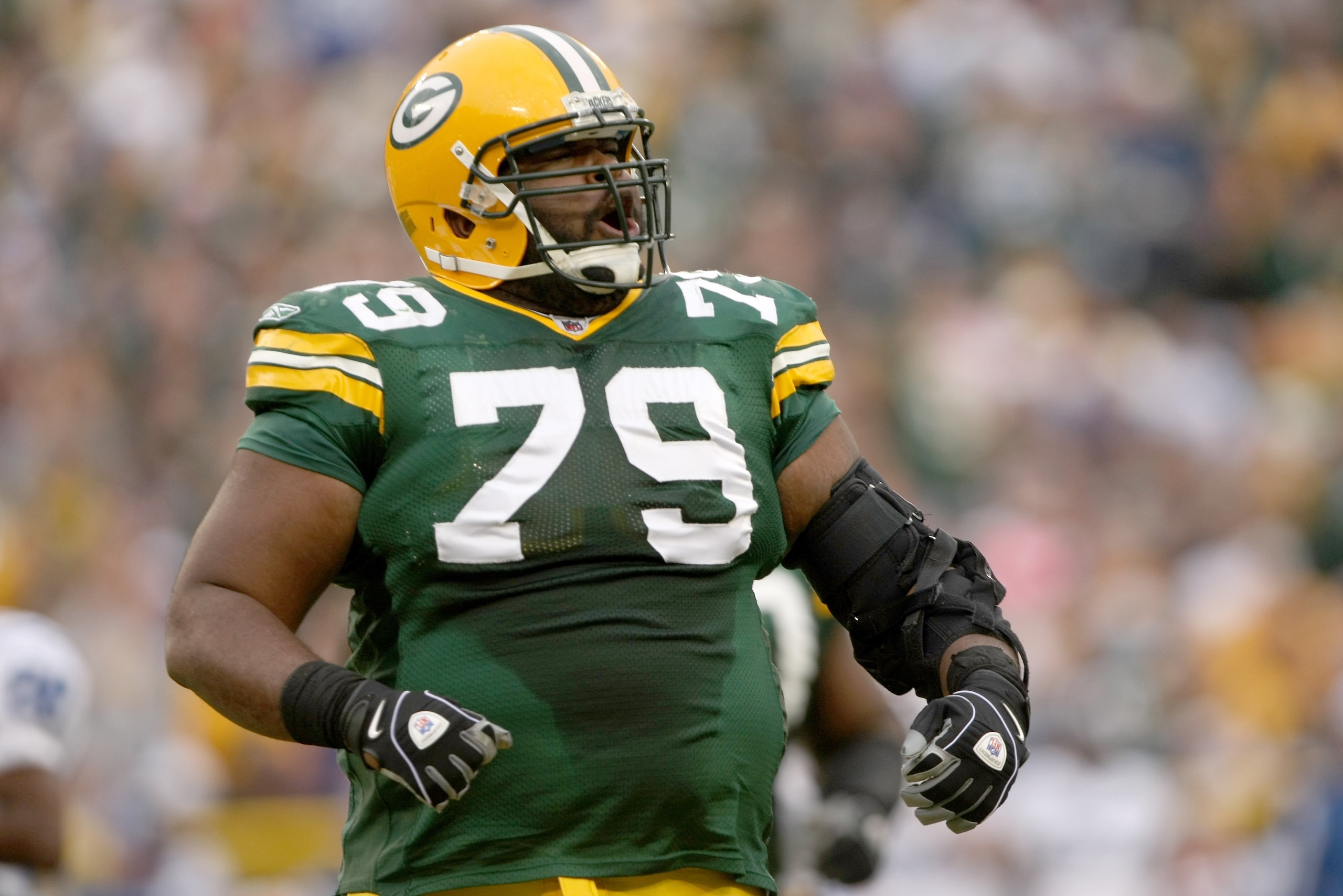 GREEN BAY, WI - OCTOBER 19:   Defensive tackle Ryan Pickett #79 of the Green Bay Packers celebrates during the game with the Indianapolis Colts on October 19, 2008 at Lambeau Field in Green Bay Wisconsin. The Packers won 34-14.   (Photo by Stephen Dunn/Ge
