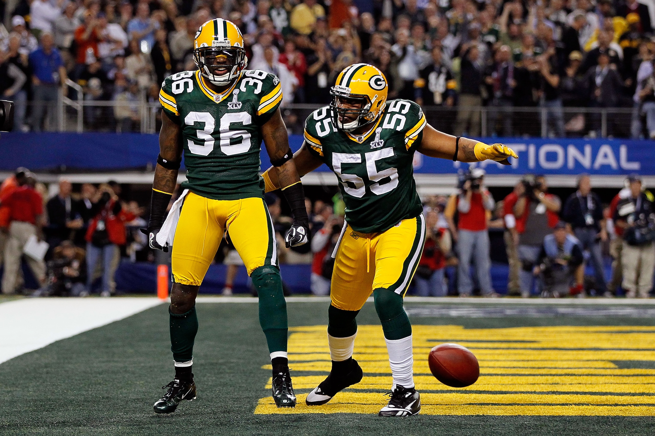 ARLINGTON, TX - FEBRUARY 06:  (L-R) Nick Collins #36 and Desmond Bishop #55 of the Green Bay Packers celebrate after Collins scored a touchdown on an interception return against the Pittsburgh Steelers during Super Bowl XLV at Cowboys Stadium on February