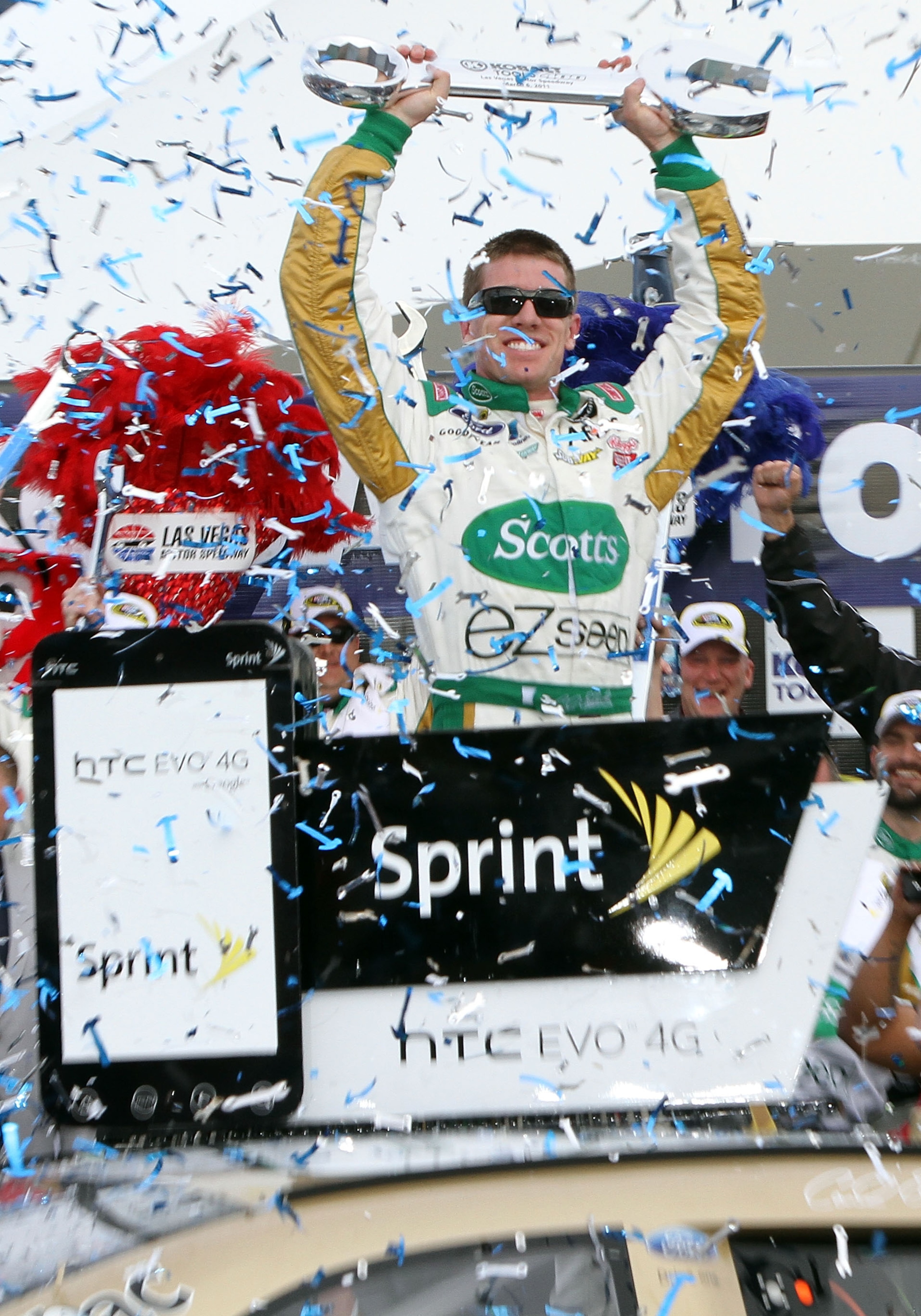 LAS VEGAS, NV - MARCH 06:  Carl Edwards, driver of the #99 Scotts/Kellogg's Ford, celebrates in Victory Lane after winning the NASCAR Sprint Cup Series Kobalt Tools 400 at Las Vegas Motor Speedway on March 6, 2011 in Las Vegas, Nevada.  (Photo by Jerry Ma