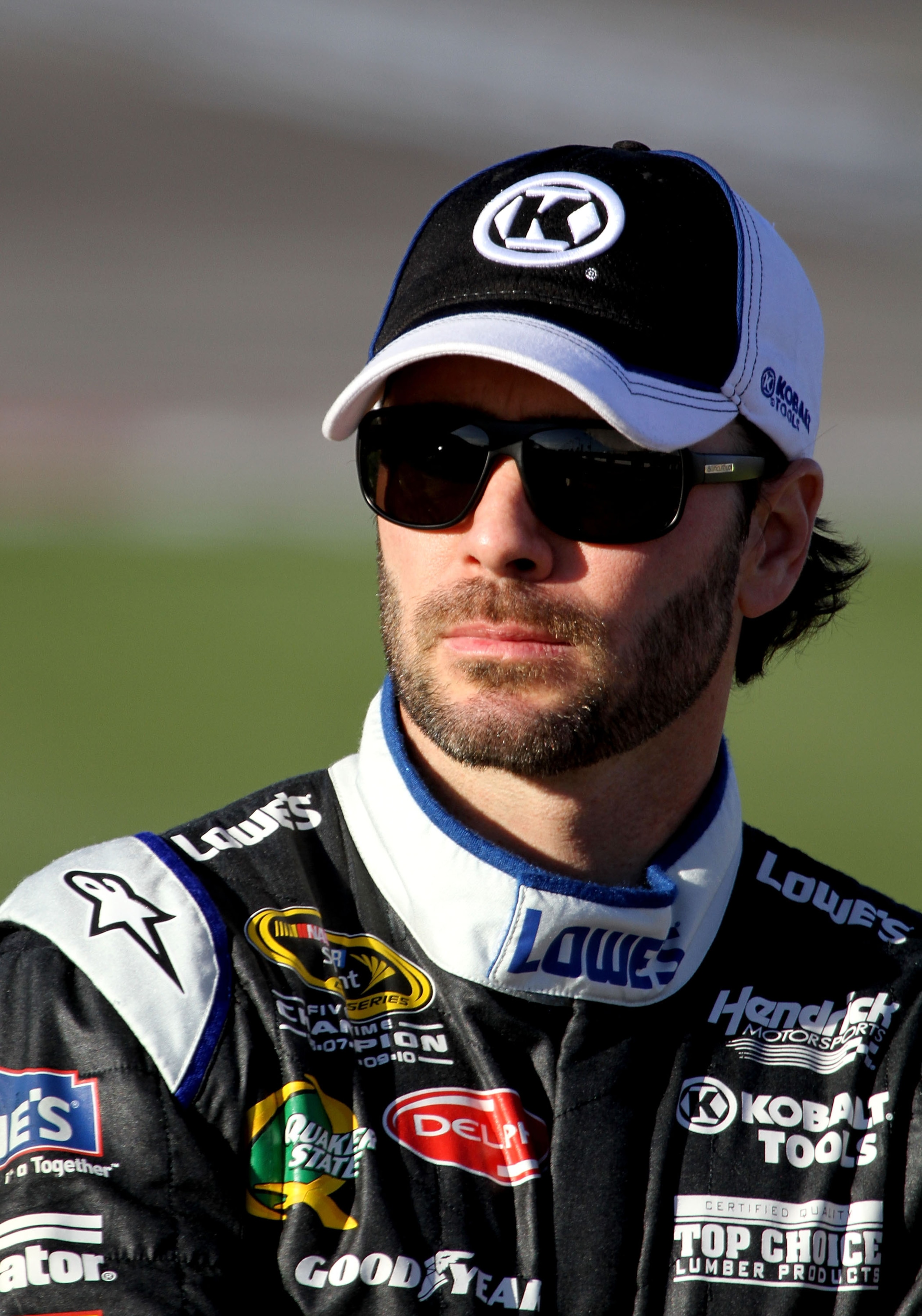 LAS VEGAS, NV - MARCH 04:  Jimmie Johnson, driver of the #48 Lowe's Chevrolet stands on the grid during qualifying for the NASCAR Sprint Cup Series Kobalt Tools 400 at Las Vegas Motor Speedway on March 4, 2011 in Las Vegas, Nevada.  (Photo by Jerry Markla