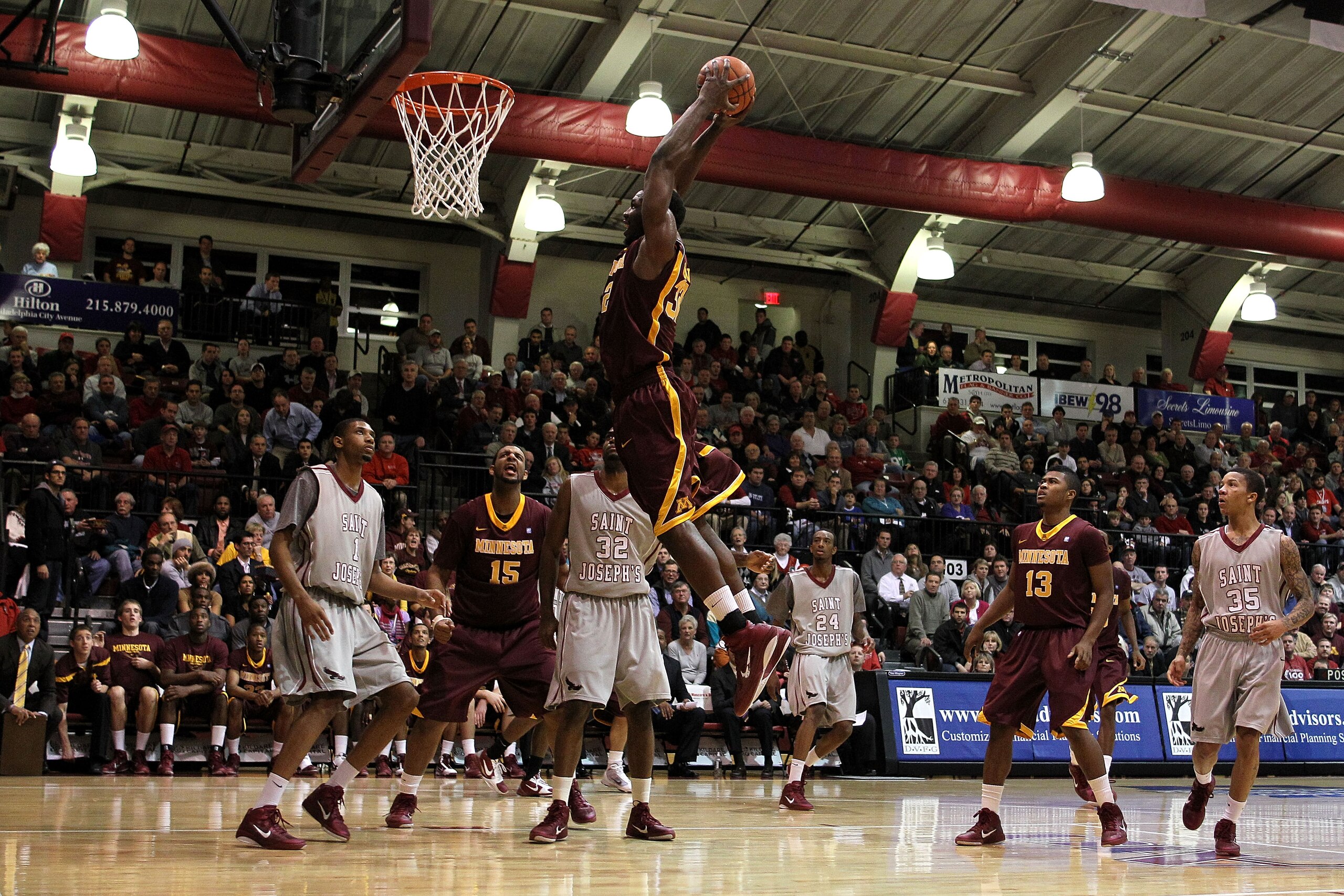 PHILADELPHIA, PA - DECEMBER 08:  Trevor Mbakwe #32 of the Minnesota Golden Gophers dunks in the second half against the St. Joseph's Hawks at Michael J. Hagan Arena on December 8, 2010 in Philadelphia, Pennsylvania.  (Photo by Chris Chambers/Getty Images)