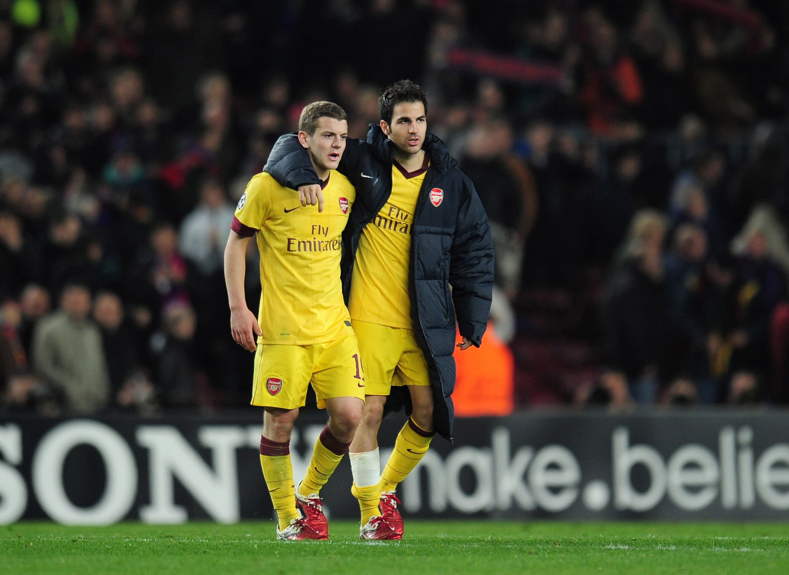 BARCELONA, SPAIN - MARCH 08:  Jack Wilshere and Cesc Fabregas of Arsenal leave the field at the end of the UEFA Champions League round of 16 second leg match between Barcelona and Arsenal at the Nou Camp Stadium on March 8, 2011 in Barcelona, Spain.  (Pho