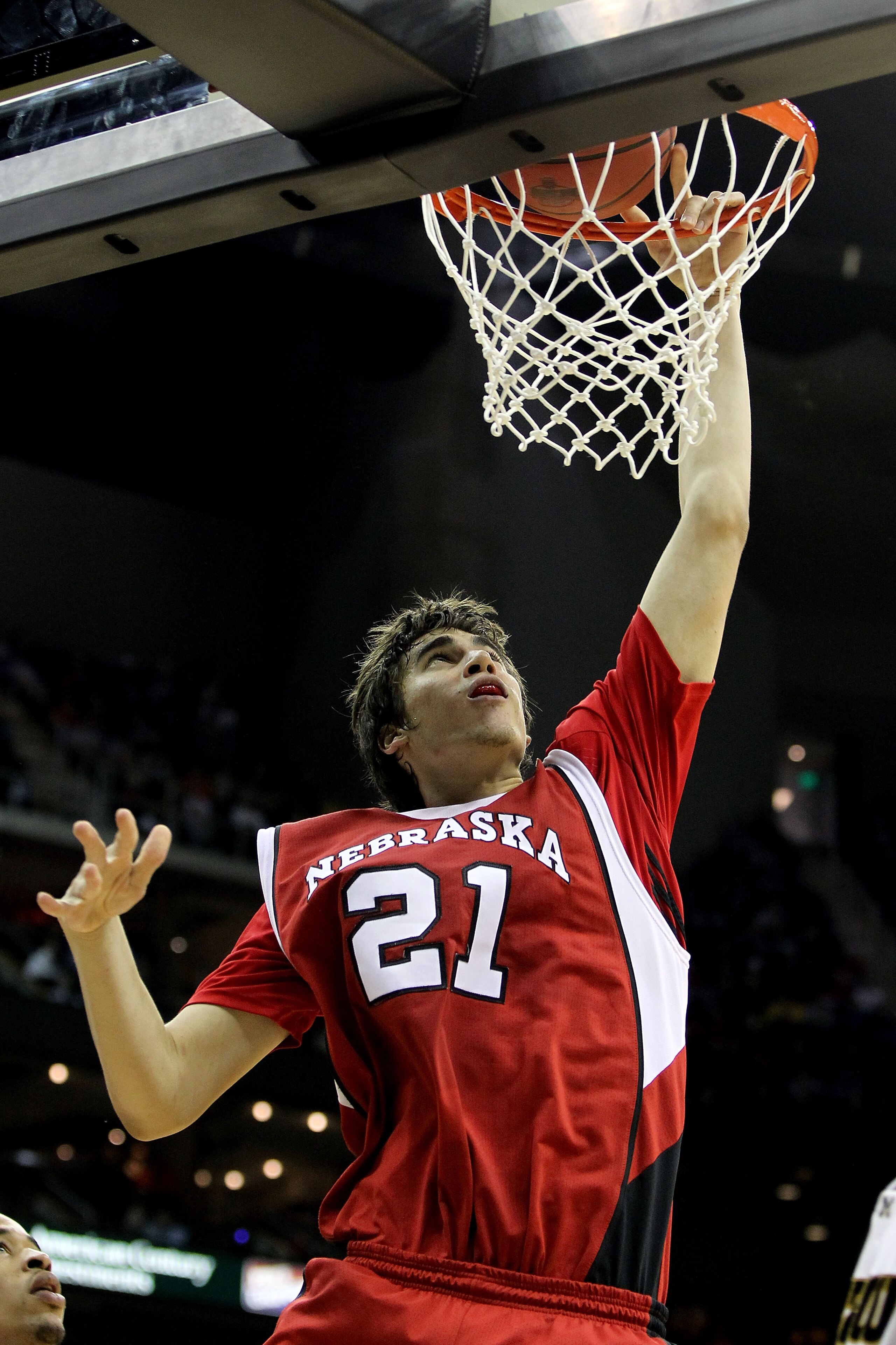 KANSAS CITY, MO - MARCH 10:  Jorge Brian Diaz #21 of the Nebraska Cornhuskers dunks the ball against the Missouri Tigers in the second half during the first round game of the 2010 Phillips 66 Big 12 Men's Basketball Tournament at the Sprint Center on Marc