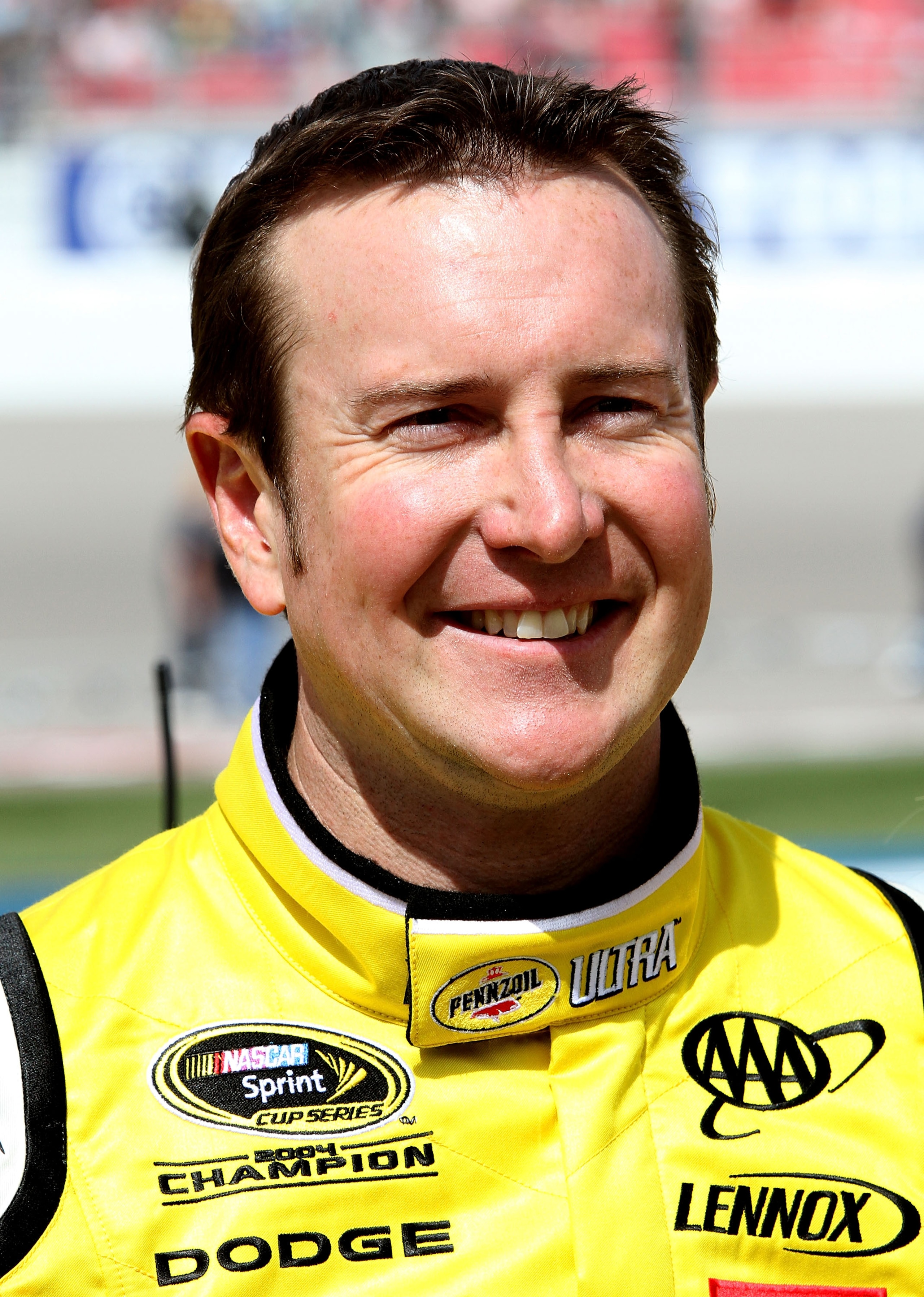 LAS VEGAS, NV - MARCH 06:  Kurt Busch, driver of the #22 Shell/Pennzoil Dodge, stands on the grid prior to the NASCAR Sprint Cup Series Kobalt Tools 400 at Las Vegas Motor Speedway on March 6, 2011 in Las Vegas, Nevada.  (Photo by Jerry Markland/Getty Ima