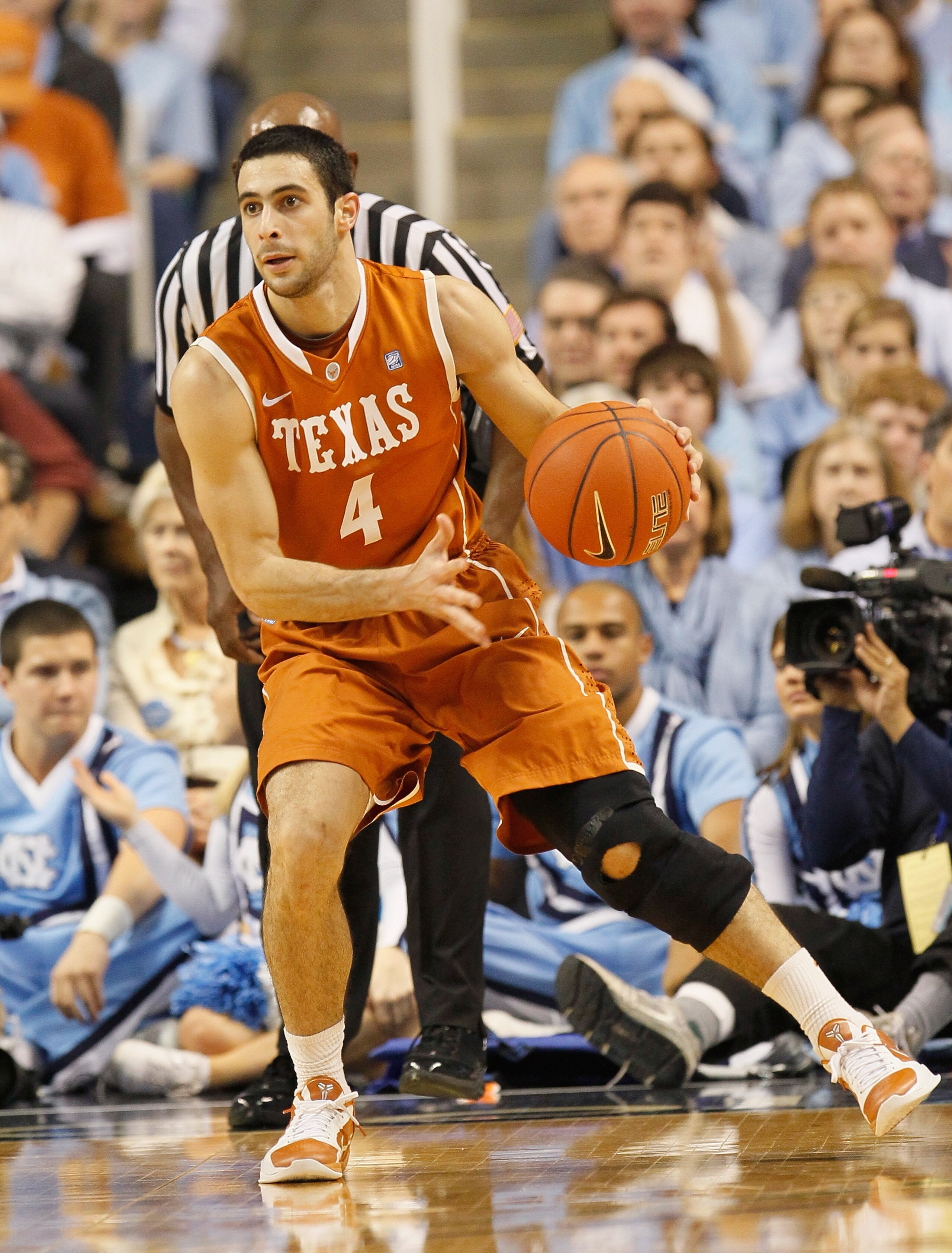 GREENSBORO, NC - DECEMBER 18:  Dogus Balbay #4 of the Texas Longhorns against the North Carolina Tar Heels at Greensboro Coliseum on December 18, 2010 in Greensboro, North Carolina.  (Photo by Kevin C. Cox/Getty Images)