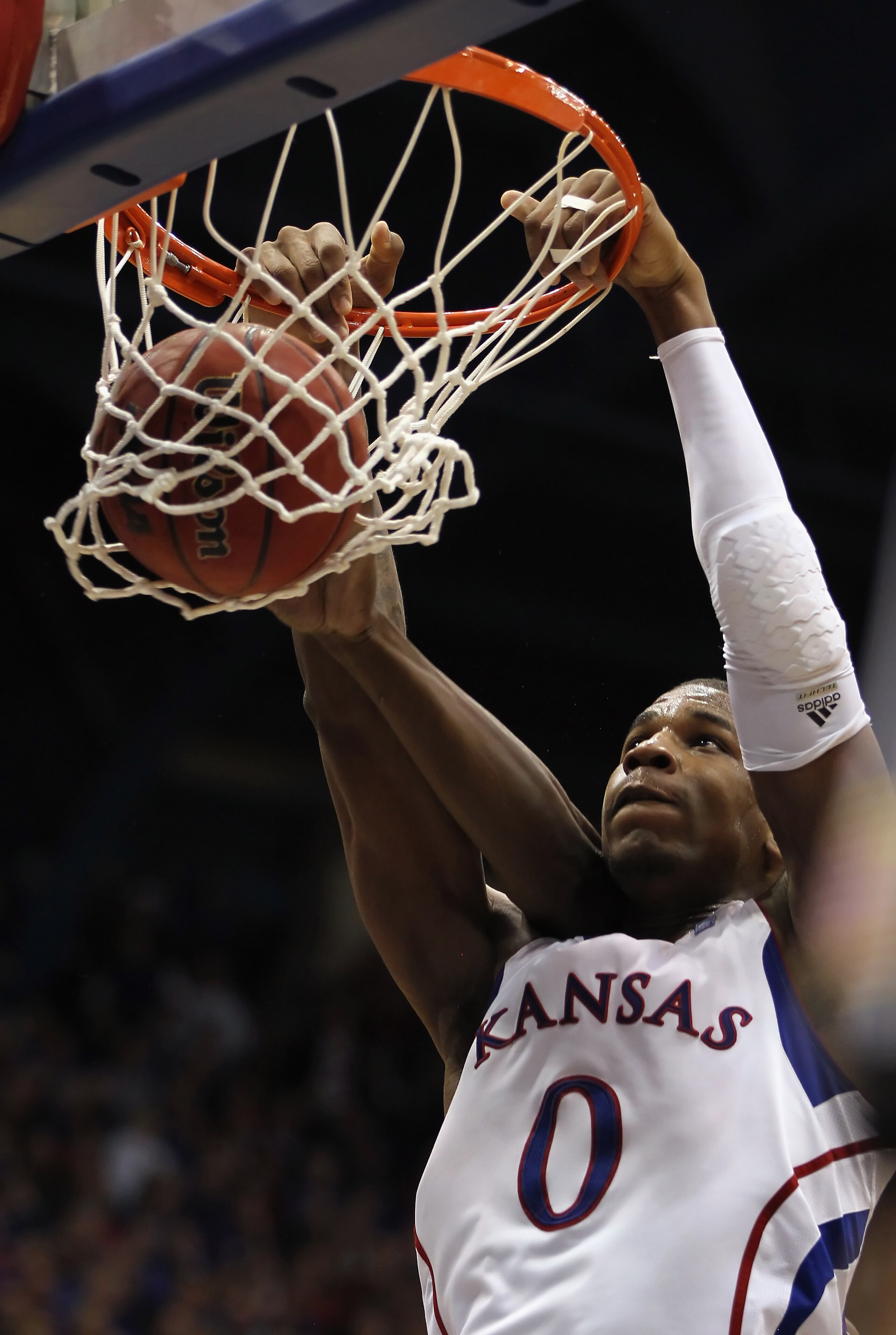 LAWRENCE, KS - JANUARY 29:  Thomas Robinson #0 of the Kansas Jayhawks dunks during the game against the Kansas State Wildcats on January 29, 2011 at Allen Fieldhouse in Lawrence, Kansas.  (Photo by Jamie Squire/Getty Images)