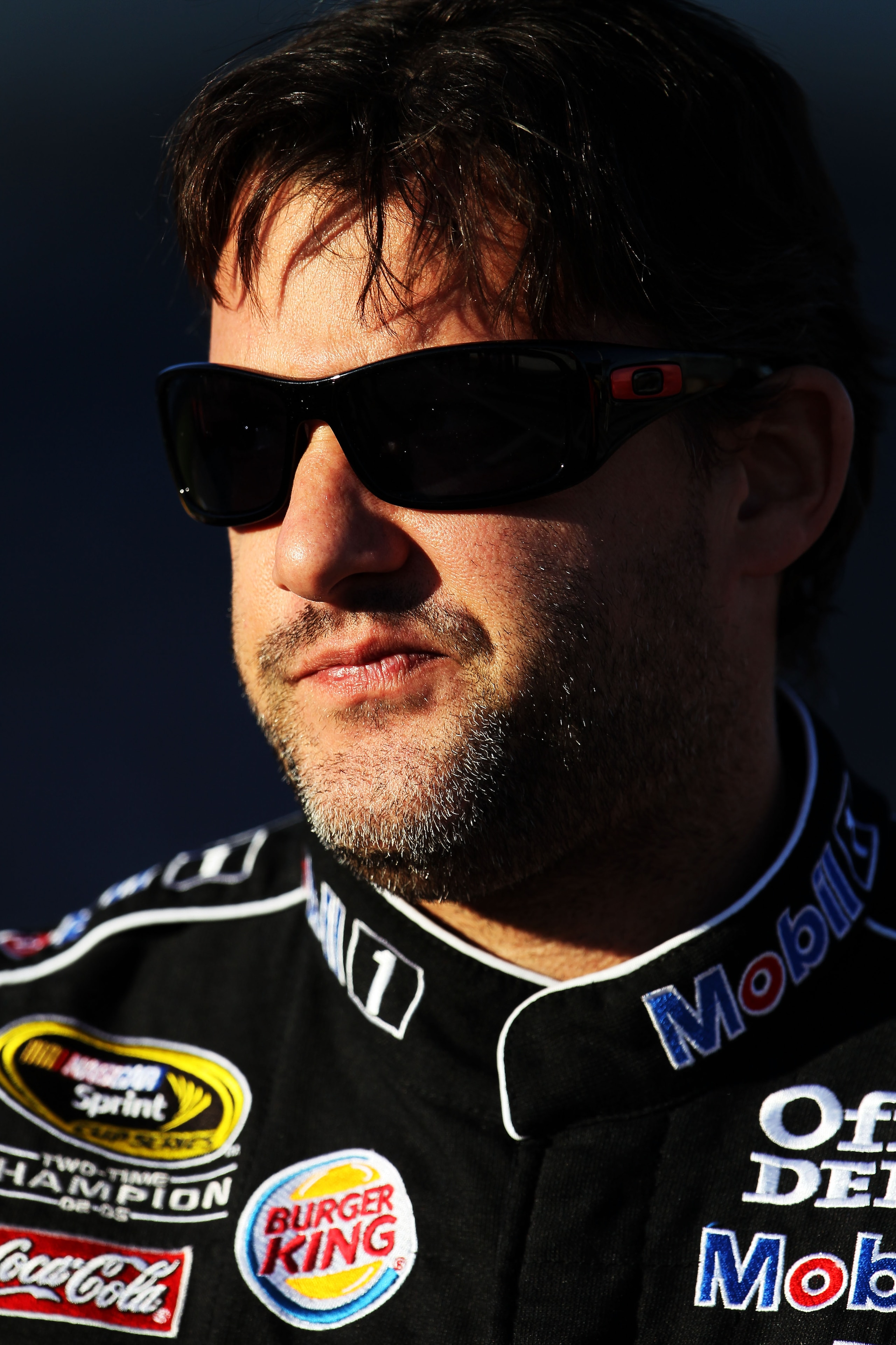 LAS VEGAS, NV - MARCH 04:  Tony Stewart, driver of the #14 Mobil1/Office Depot Chevrolet, stands on pit road during qualifying for the NASCAR Sprint Cup Series Kobalt Tools 400 at Las Vegas Motor Speedway on March 4, 2011 in Las Vegas, Nevada.  (Photo by