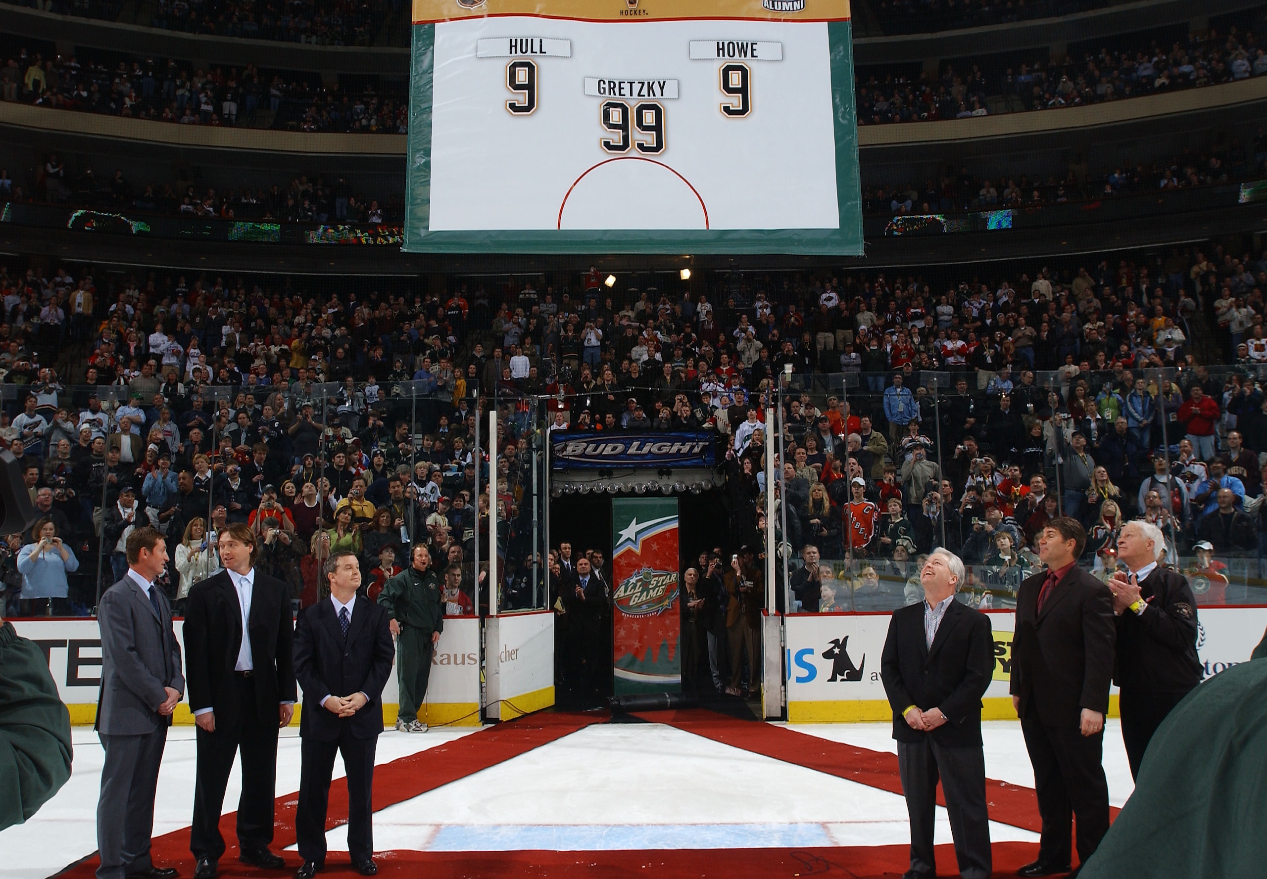 ST. PAUL, MN - FEBRUARY 8: A banner is raised to honor legendary hockey players who were voted to the All-Time Legendary All-Star team including Bobby Hull #9, Wayne Gretzky #99, and Gordie Howe #9, during the first intermission of the 54th NHL All-Star ST. PAUL, MN - FEBRUARY 8: A banner is raised to honor legendary hockey players who were voted to the All-Time Legendary All-Star team including Bobby Hull #9, Wayne Gretzky #99, and Gordie Howe #9, during the first intermission of the 54th NHL All-Star