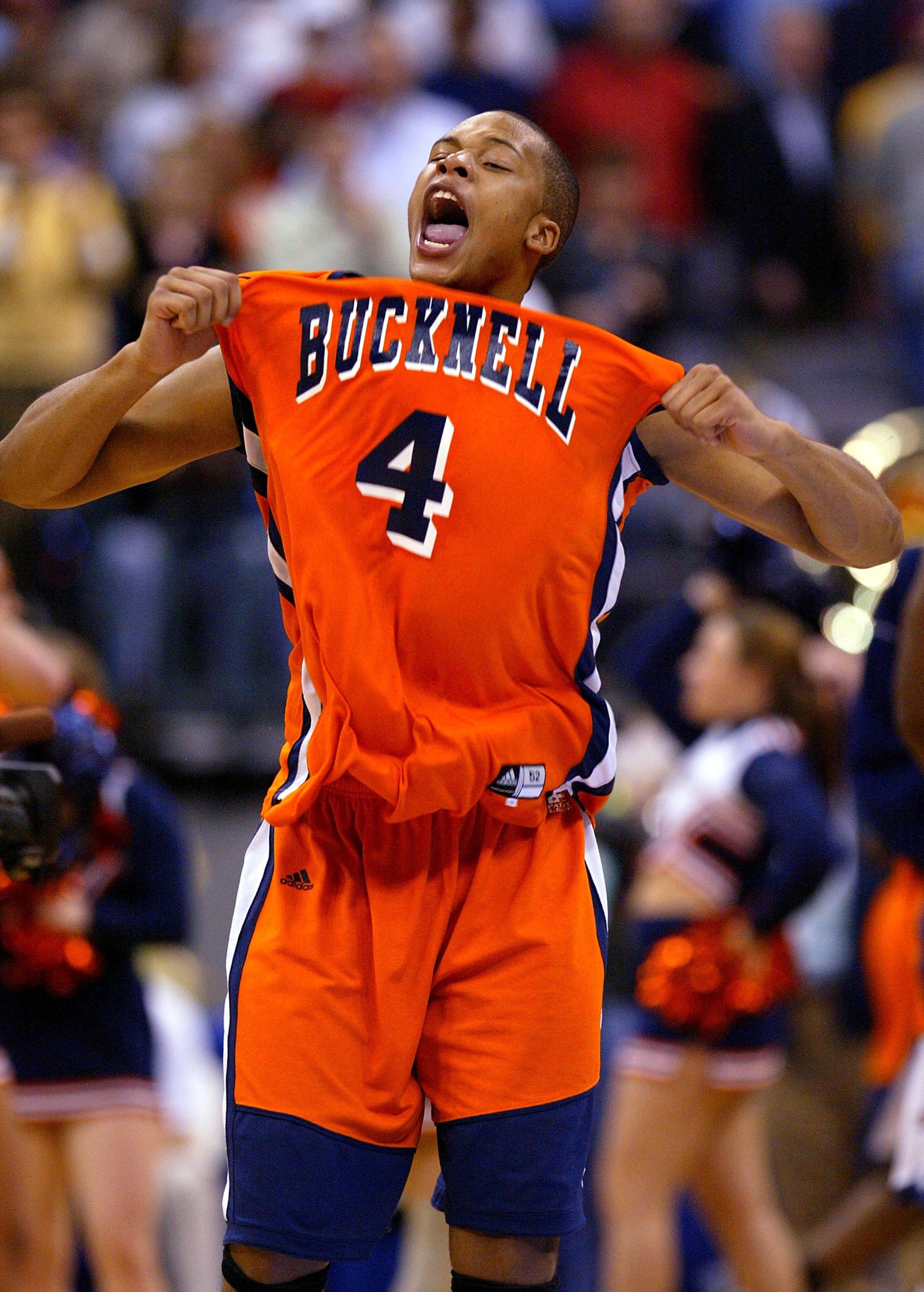 OKLAHOMA CITY - MARCH 18:  Donald Young #4 of the Bucknell Bison screams as his team upset the Kansas Jayhawks during the first round of the NCAA Men's Basketball Championship on March 18, 2005 at the Ford Center in Oklahoma City, Oklahoma. Bucknell knock