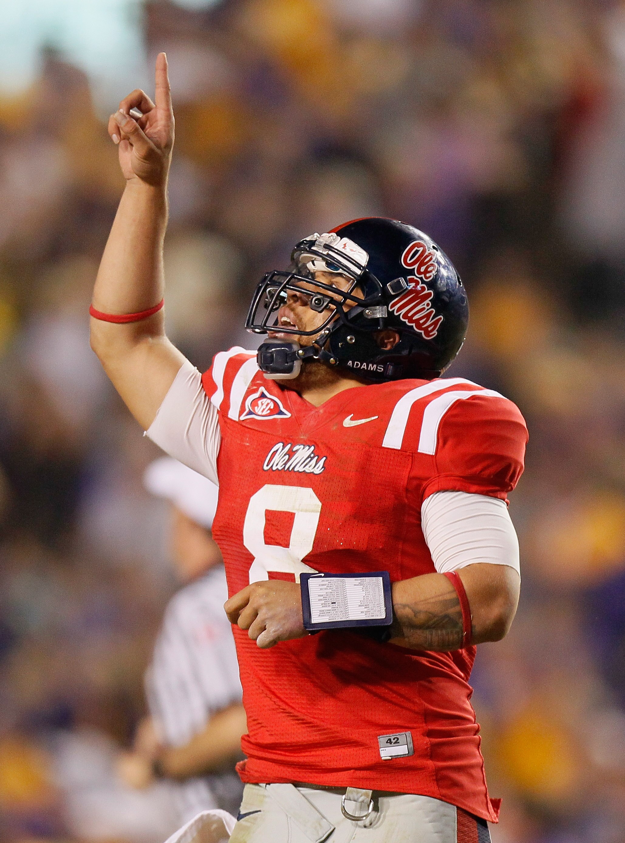 BATON ROUGE, LA - NOVEMBER 20: Jeremiah Masoli #8 of the Ole Miss Rebels against the Louisiana State University Tigers at Tiger Stadium on November 20, 2010 in Baton Rouge, Louisiana. (Photo by Kevin C. Cox/Getty Images) BATON ROUGE, LA - NOVEMBER 20: Jeremiah Masoli #8 of the Ole Miss Rebels against the Louisiana State University Tigers at Tiger Stadium on November 20, 2010 in Baton Rouge, Louisiana. (Photo by Kevin C. Cox/Getty Images)