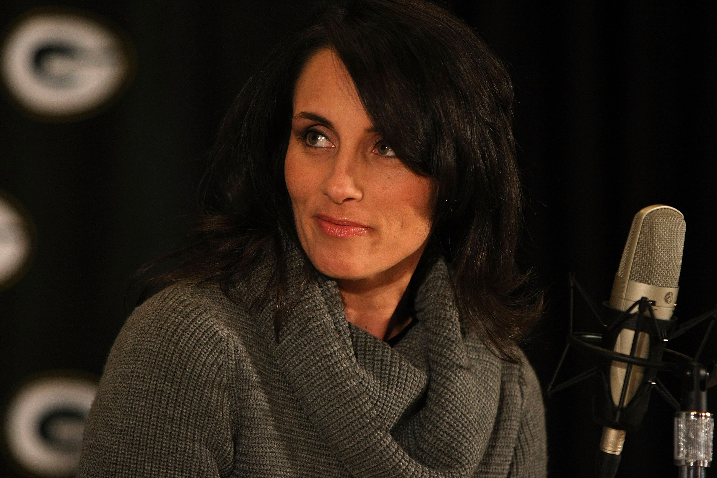 GREEN BAY, WI - MARCH 6: Deanna Favre, wife of former quarterback Brett Favre of the Green Bay Packers, listens as Favre talks about his retirement at a press conference at Lambeau Field March 6, 2008 in Green Bay, Wisconsin. (Photo by Jonathan Daniel/Get