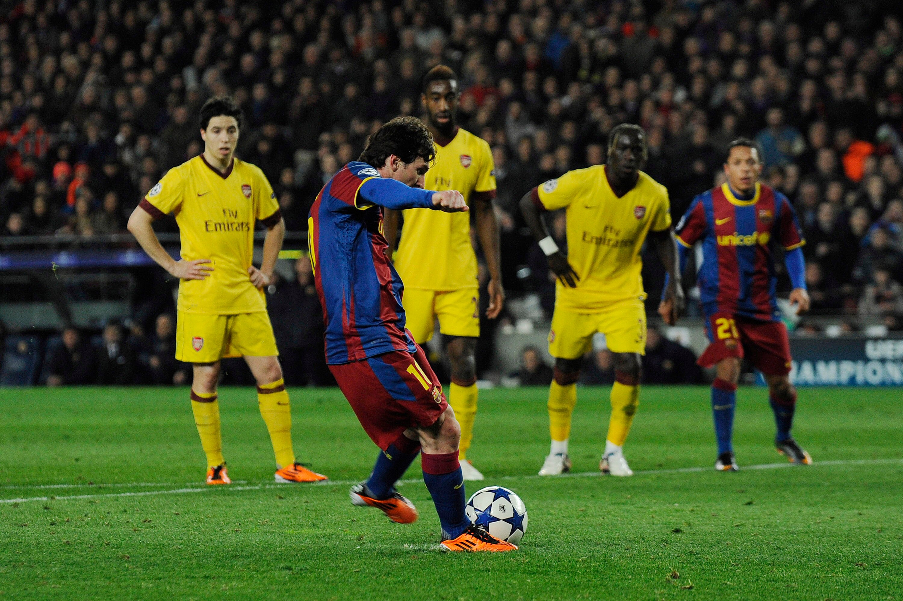 BARCELONA, SPAIN - MARCH 08:  Lionel Messi of FC Barcelona (C) scores his second goal during the UEFA Champions League round of 16 second leg match between Barcelona and Arsenal at the Camp Nou stadium on March 8, 2011 in Barcelona, Spain. Barcelona won 3