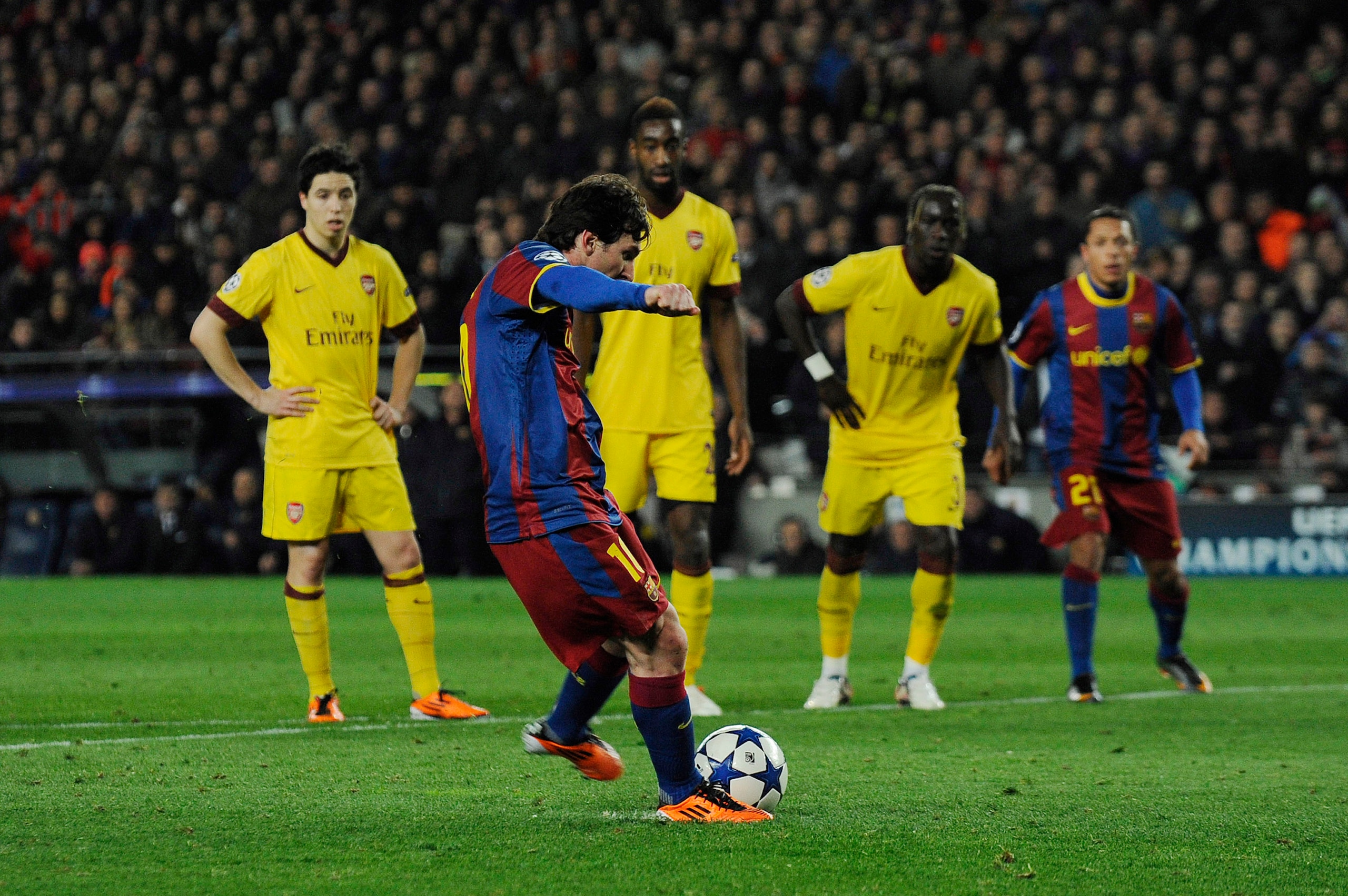 BARCELONA, SPAIN - MARCH 08:  Lionel Messi of FC Barcelona (C) scores his second goal during the UEFA Champions League round of 16 second leg match between Barcelona and Arsenal at the Camp Nou stadium on March 8, 2011 in Barcelona, Spain. Barcelona won 3