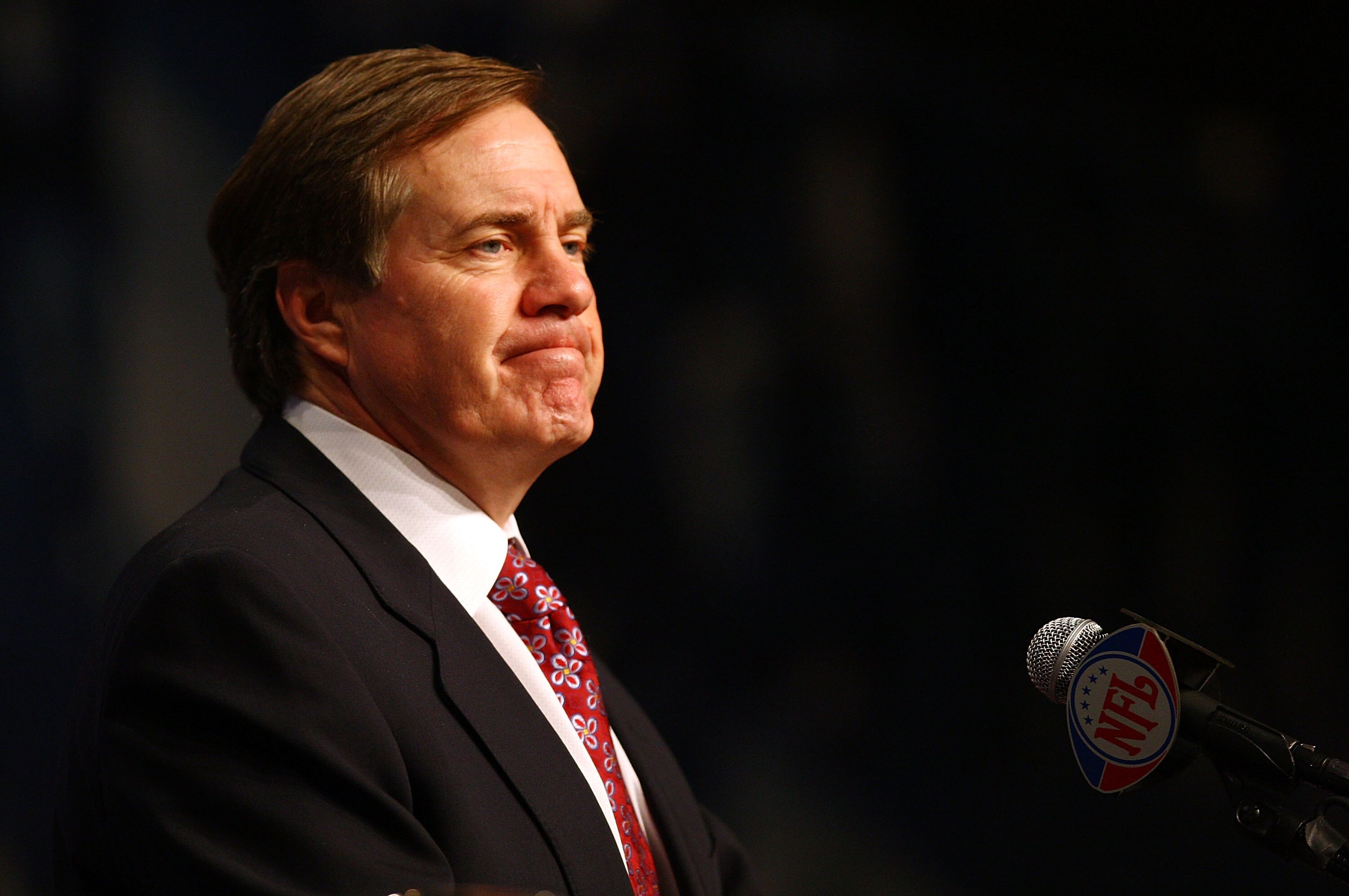 PHOENIX - FEBRUARY 01:  Head coach Bill Belichick of the New England Patriots answers questions during a press conference on February 1, 2008 at the Phoenix Convention Center in Phoenix, Arizona.  (Photo by Elsa/Getty Images)