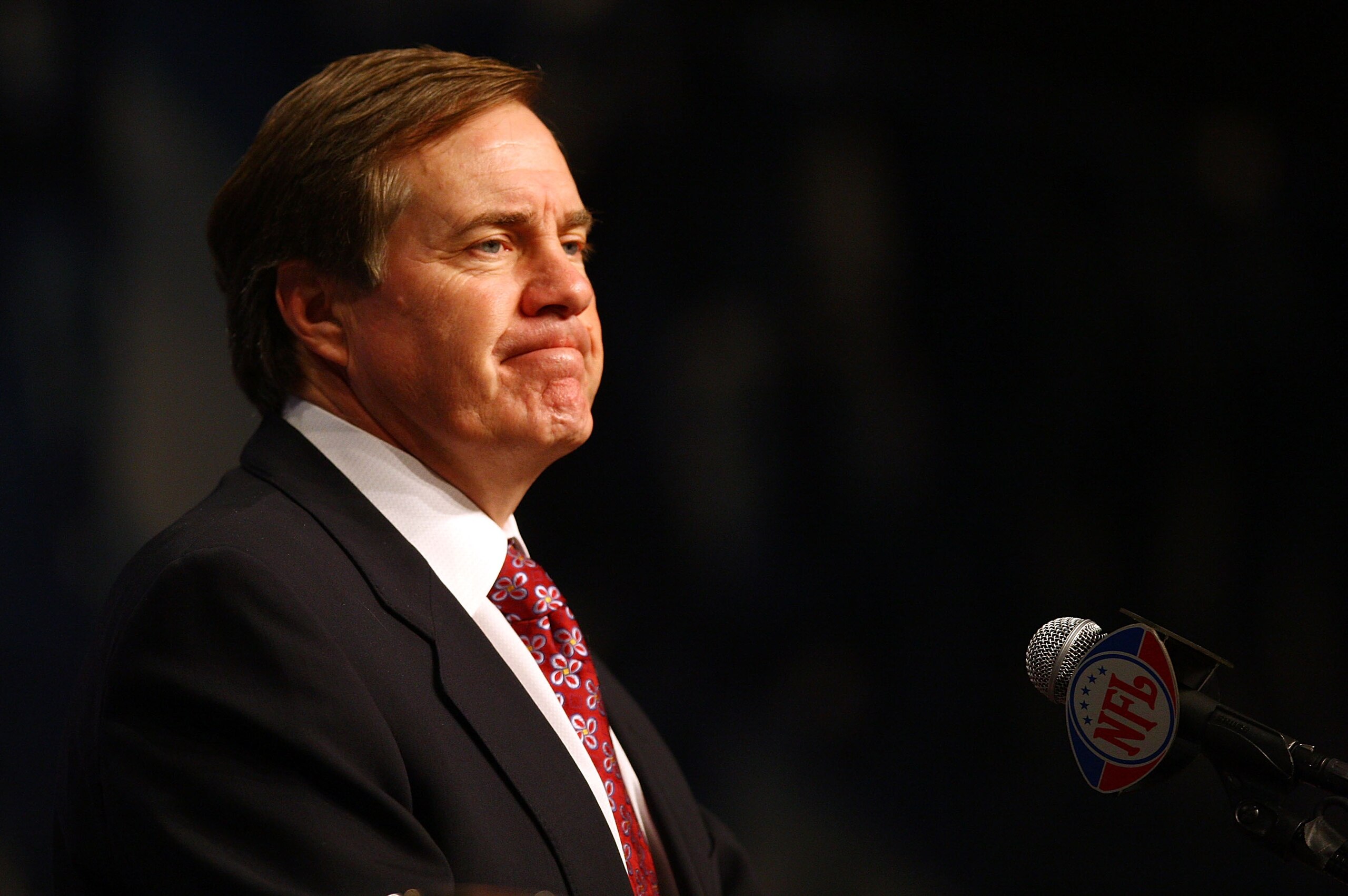 PHOENIX - FEBRUARY 01:  Head coach Bill Belichick of the New England Patriots answers questions during a press conference on February 1, 2008 at the Phoenix Convention Center in Phoenix, Arizona.  (Photo by Elsa/Getty Images)