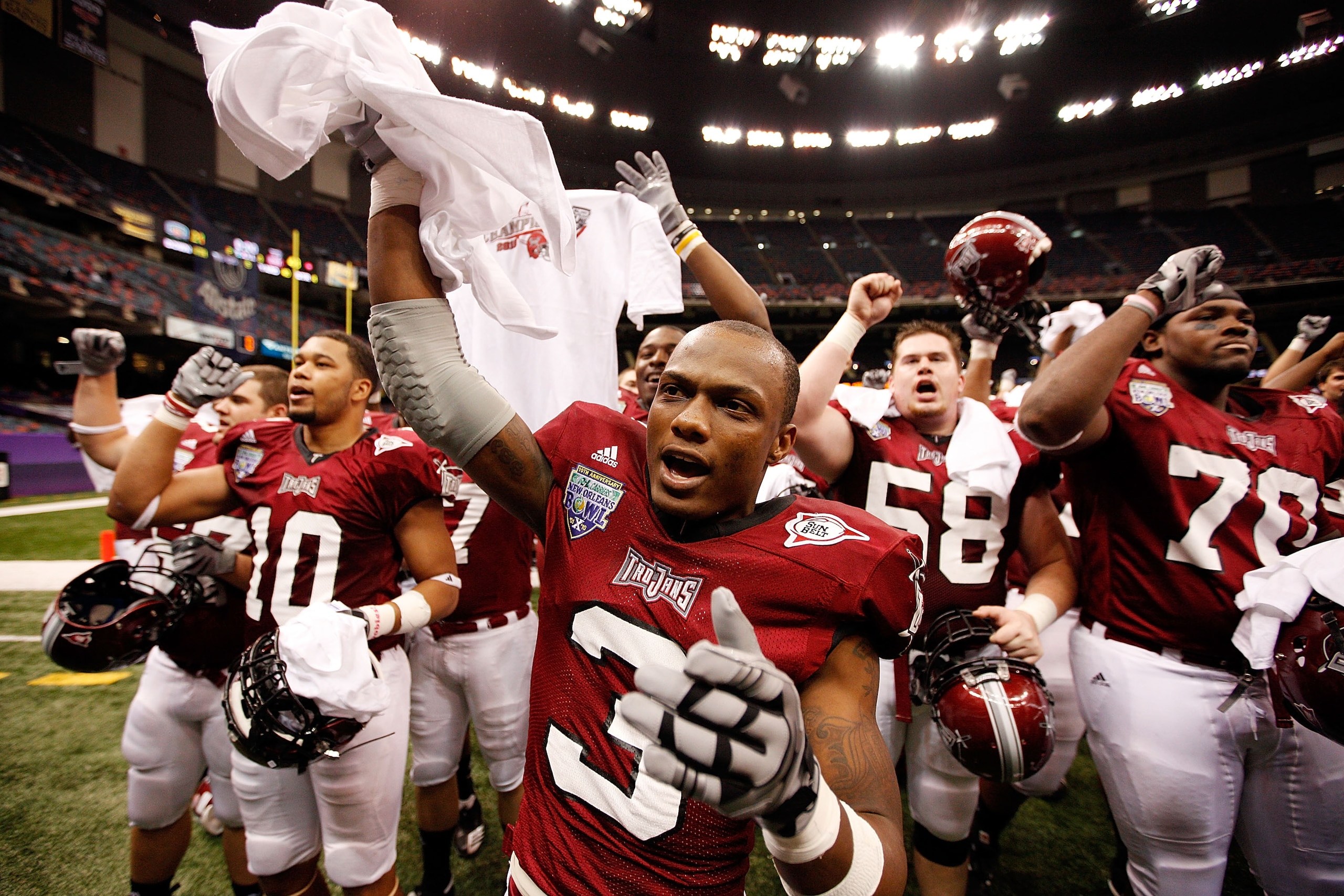 NEW ORLEANS, LA - DECEMBER 18:  Jerrell Jernigan #3 of the Troy University Trojans celebrates after defeating the Ohio University Bobcats 48-21 during the R&L Carriers New Orleans Bowl at the Louisiana Superdome on December 18, 2010 in New Orleans, Louisi