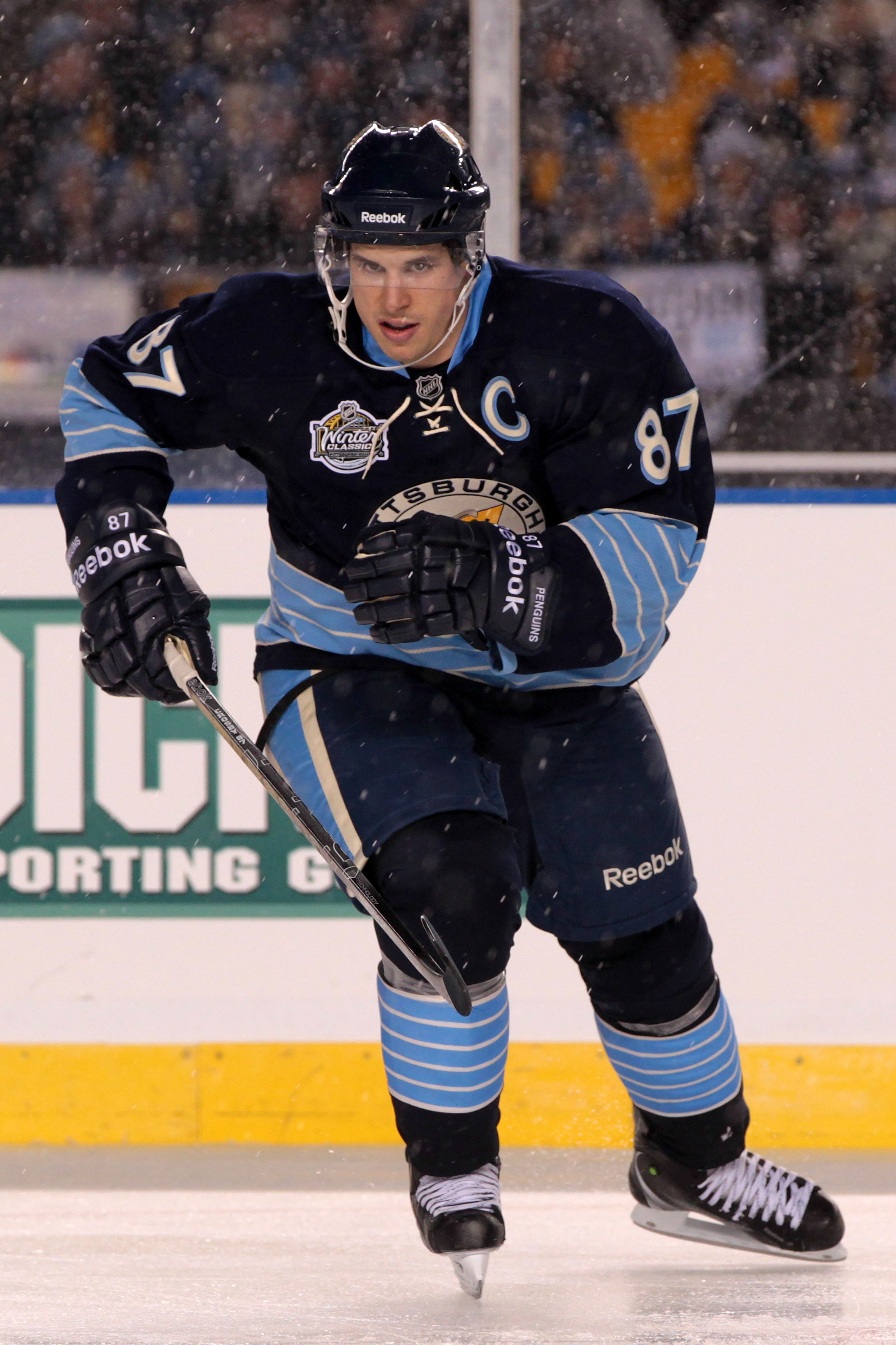 PITTSBURGH, PA - JANUARY 01: Sidney Crosby #87 of the Pittsburgh Penguins skates against the Washington Capitals during the 2011 NHL Bridgestone Winter Classic at Heinz Field on January 1, 2011 in Pittsburgh, Pennsylvania. Washington won 3-1. (Photo by PITTSBURGH, PA - JANUARY 01: Sidney Crosby #87 of the Pittsburgh Penguins skates against the Washington Capitals during the 2011 NHL Bridgestone Winter Classic at Heinz Field on January 1, 2011 in Pittsburgh, Pennsylvania. Washington won 3-1. (Photo by